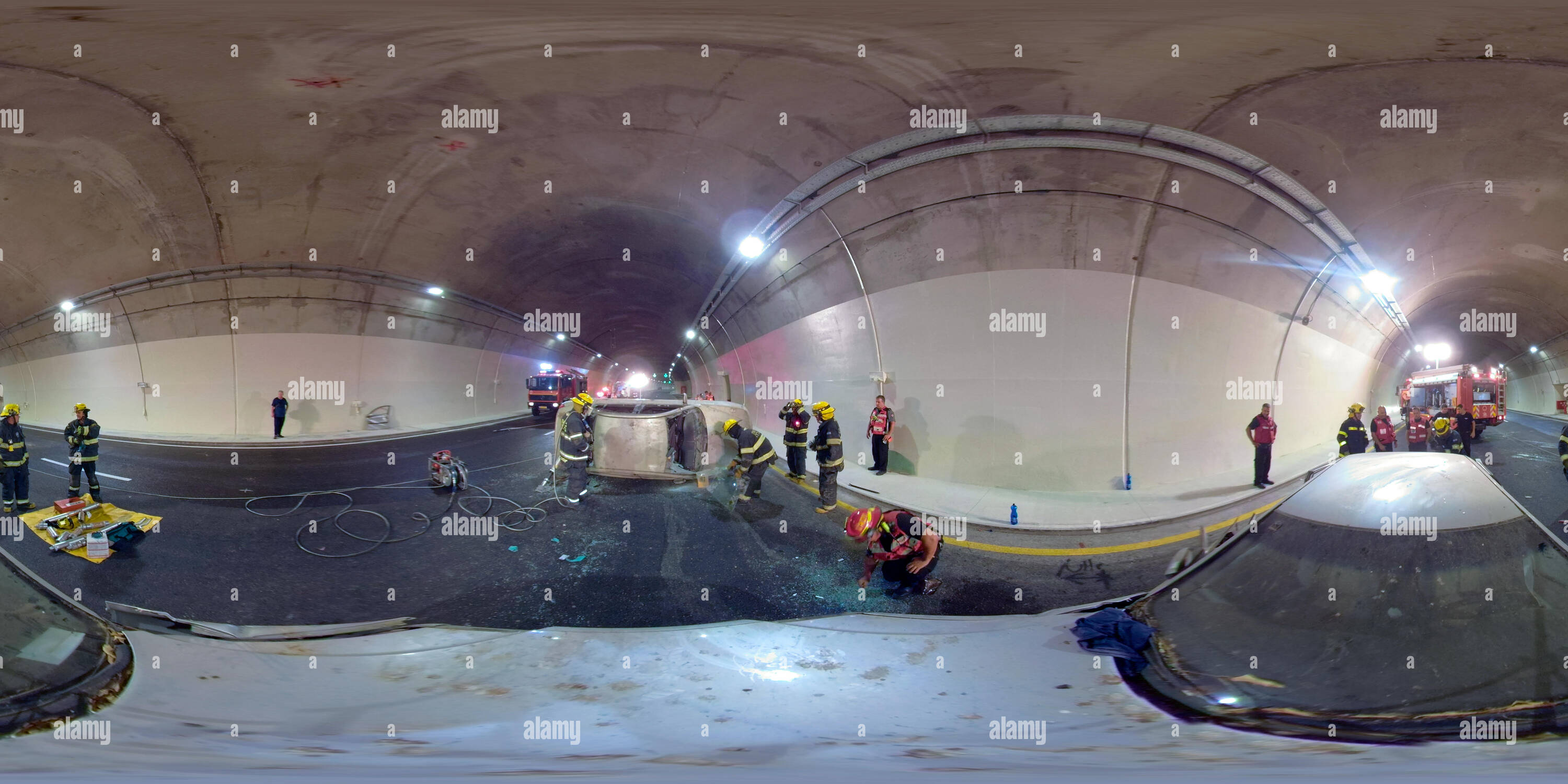 360 degree panoramic view of Firefighters disassemble a car in car accident during a drill in Kashish Tunnels, Road 6, Israel. 360 photo vr panorama 2:1 aspect ratio for VR apps