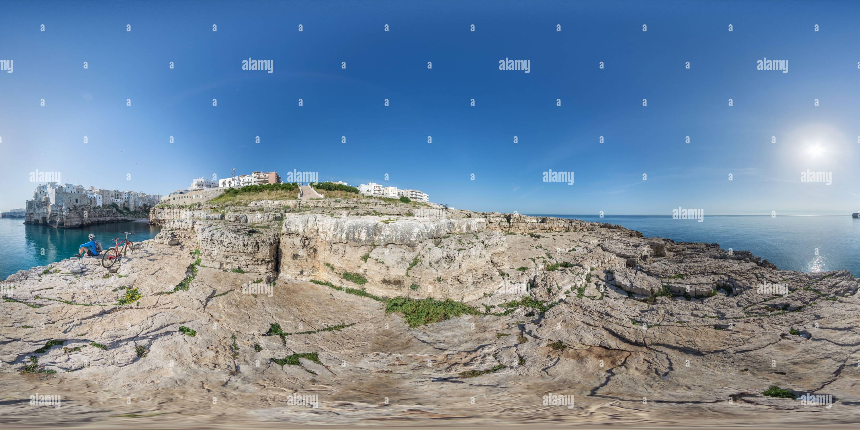 360 degree panoramic view of polignano a mare in mountain bike