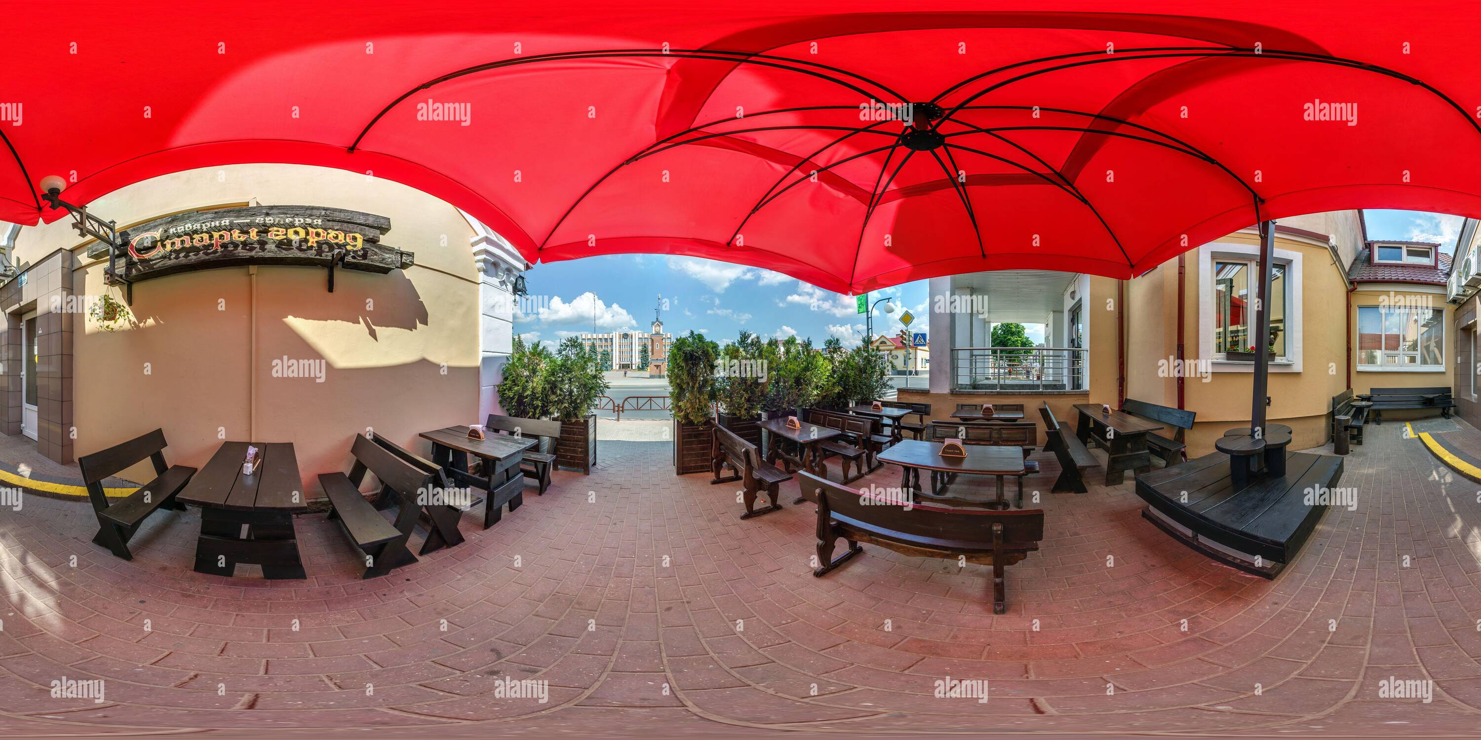 360 degree panoramic view of GRODNO, BELARUS - MAY 2019: Full spherical seamless hdri panorama 360 degrees in summer terrace in cafe of city center under an umbrella in equirectan