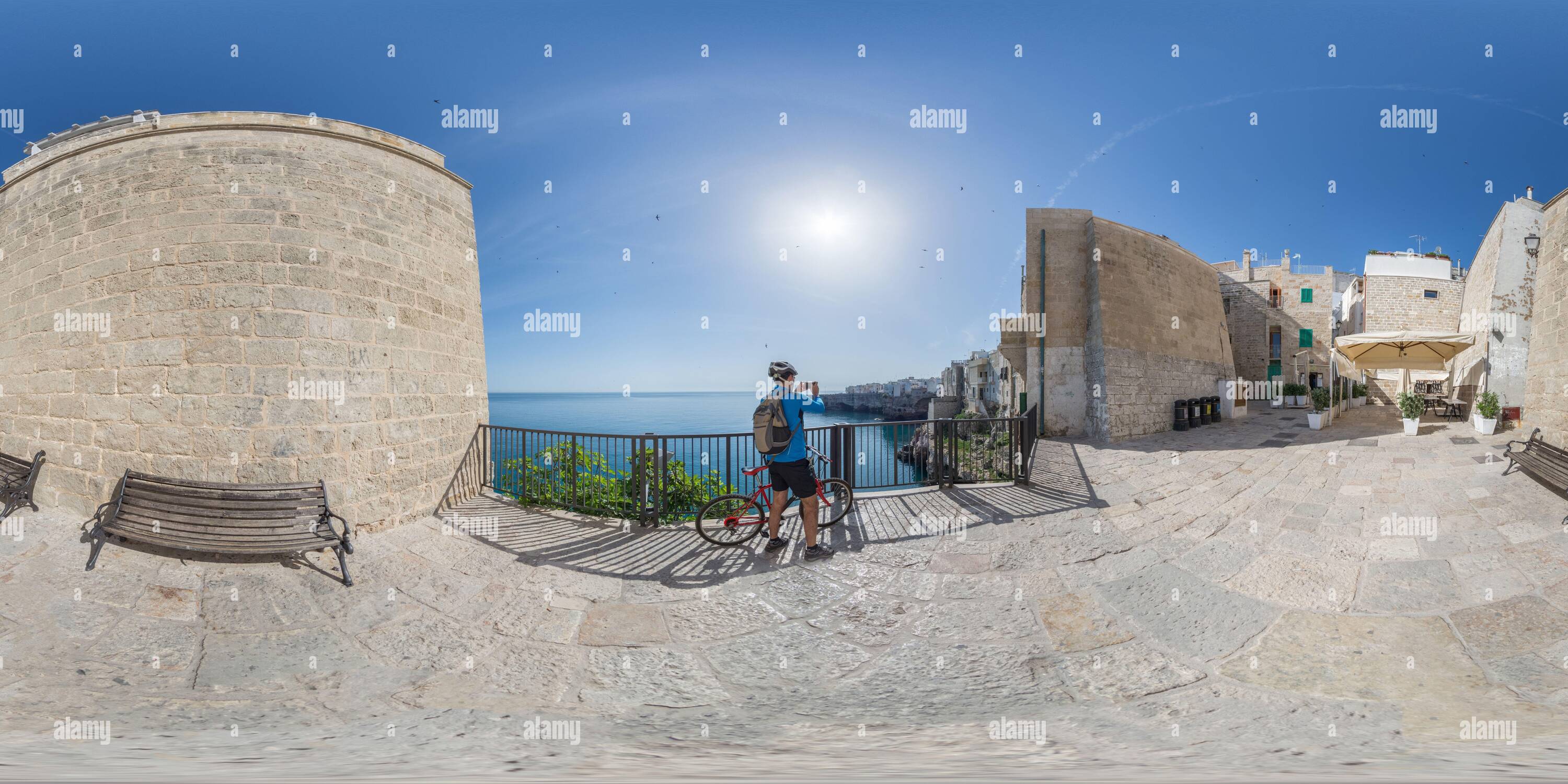 360 degree panoramic view of Vista di Polignano a Mare con ciclista