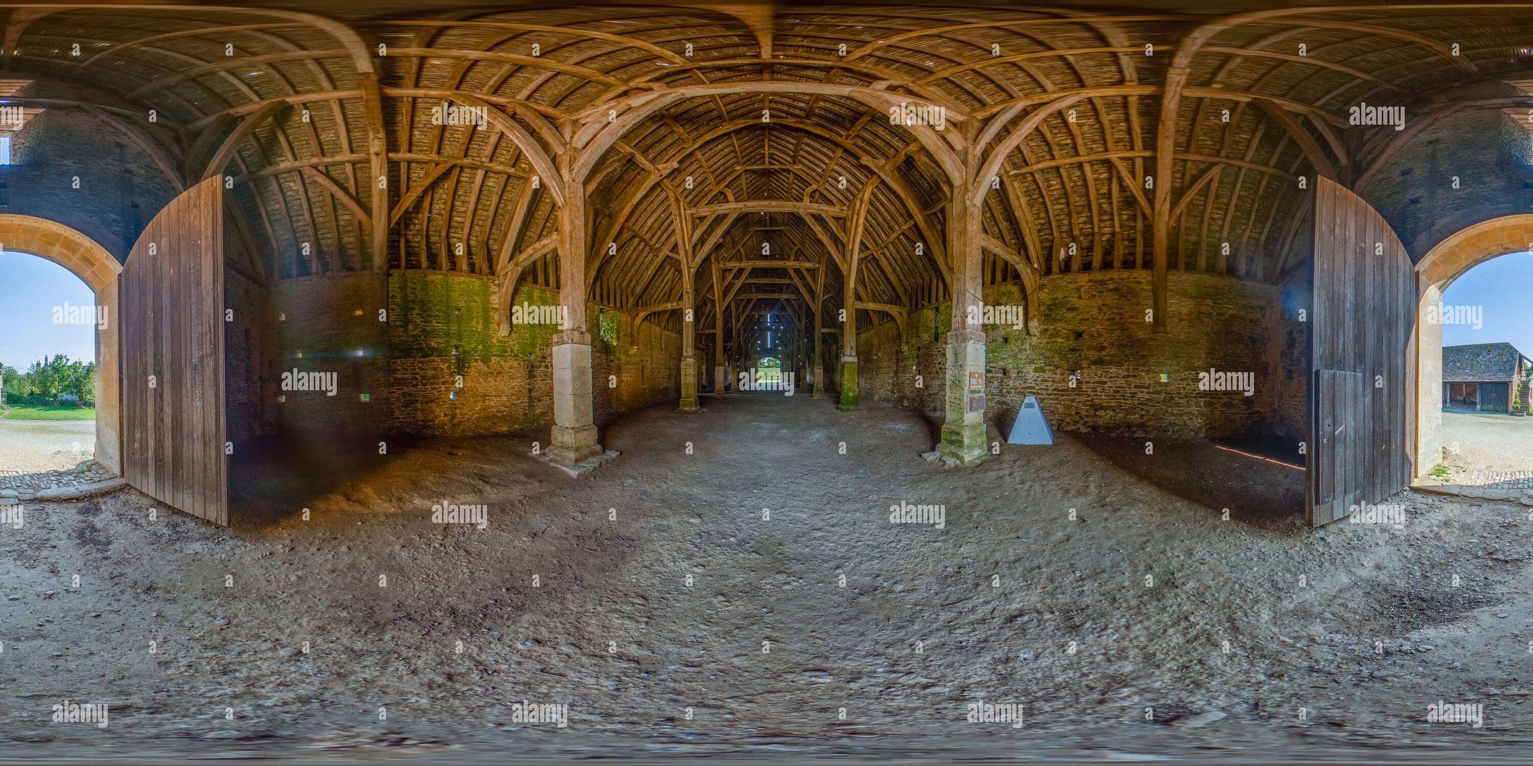 360 degree panoramic view of Interior of Great Coxwell Tithe Barn at front entrance