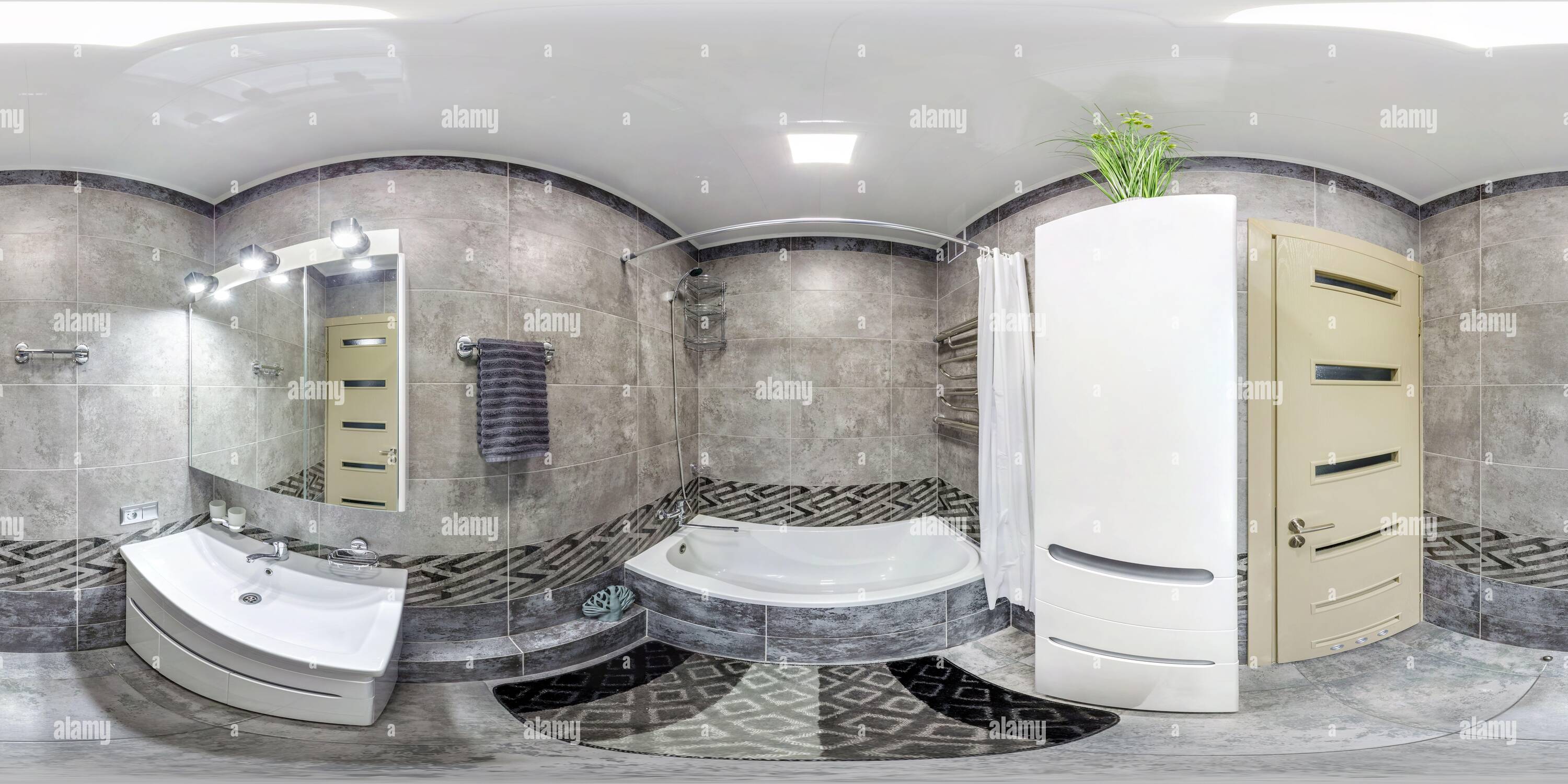 360 degree panoramic view of MINSK, BELARUS - MAY, 2020: full seamless hdri panorama 360 degrees angle view in interior of bathroom with white ceramic bath in equirectangular proj