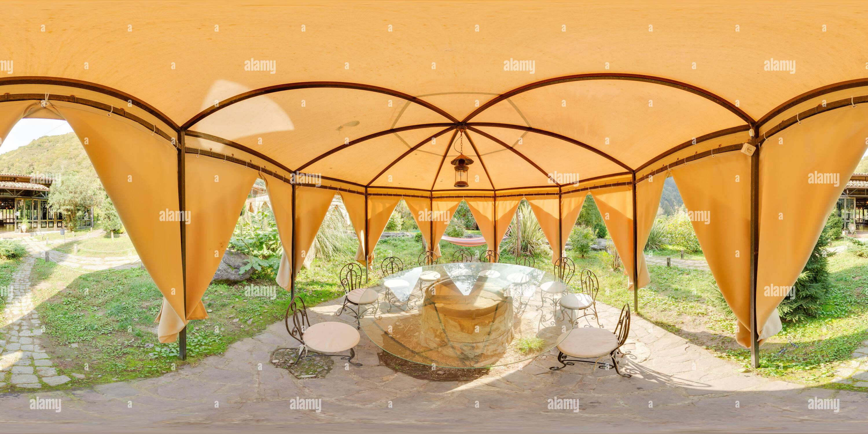 360 degree panoramic view of fabric garden pavilion with table and chairs inside view background Image with 3D spherical panorama with 360 degree viewing angle Ready for virtual r