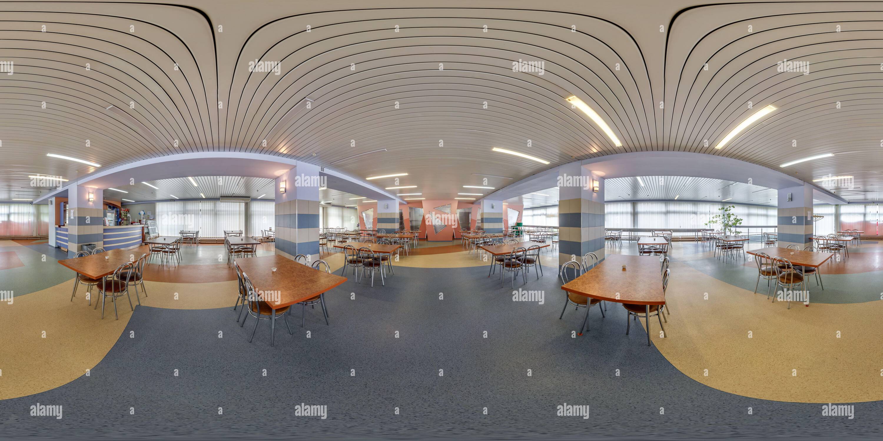 360 degree panoramic view of MOSCOW, RUSSIA - MARCH, 2022: spherical seamless hdr 360 panorama in public dining room with rows of tables and chairs in equirectangular projection.