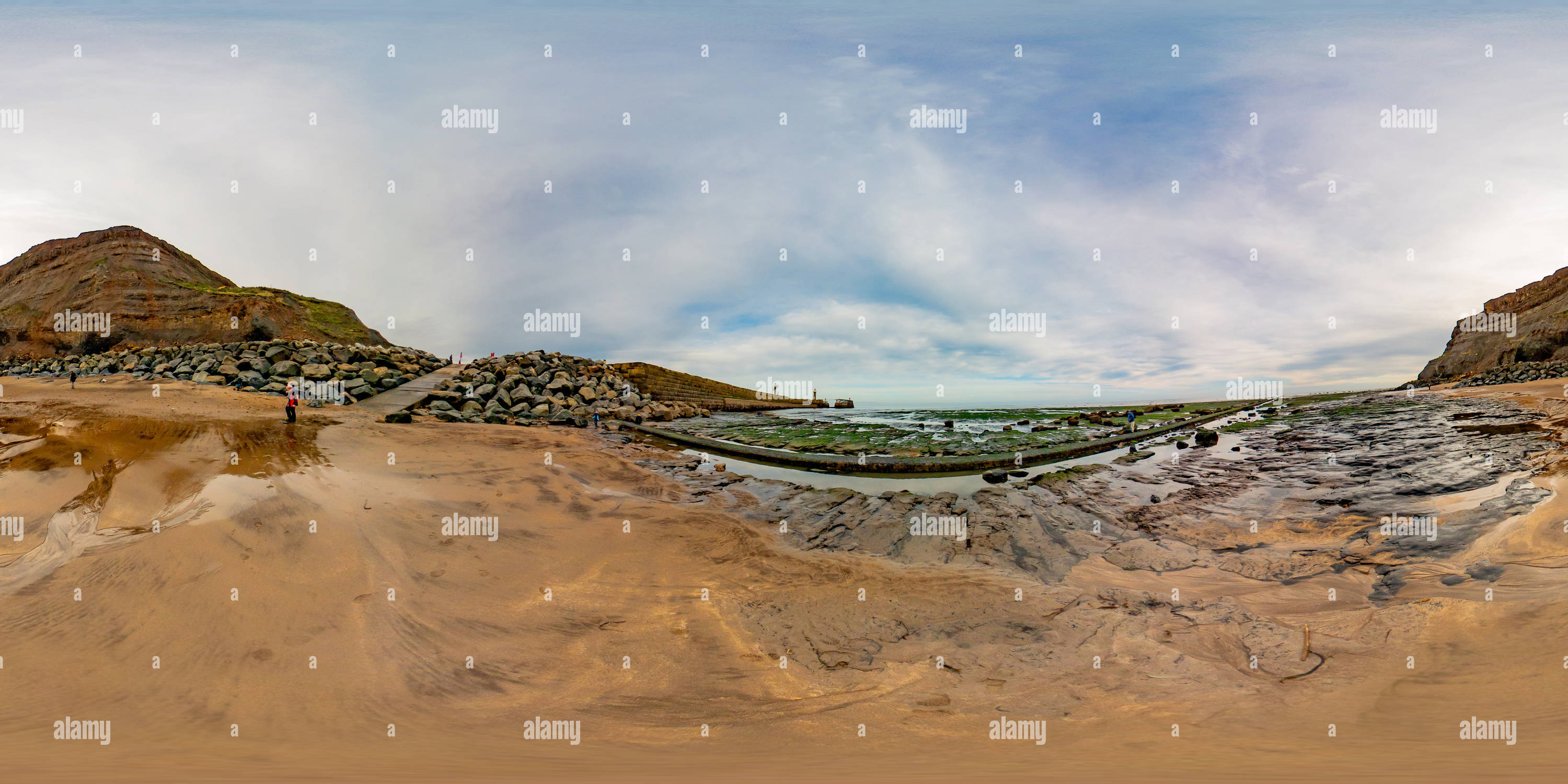 360° view of Searching for fossils on Whitby beach Alamy
