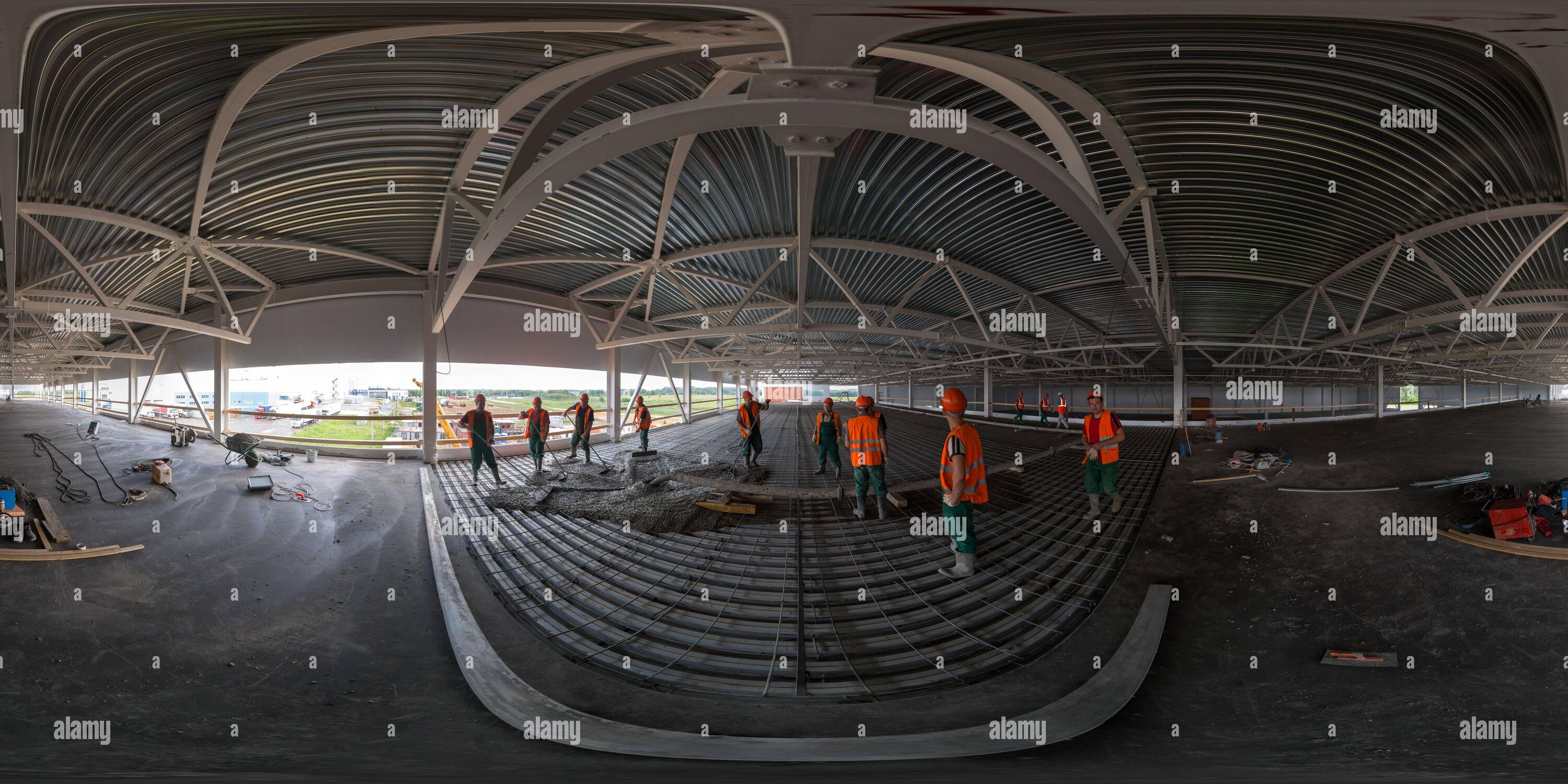 360 degree panoramic view of Seamless full spherical 360 degree panorama in equirectangular projection of concrete floor filling process in industrial building in Tula, Russia - J