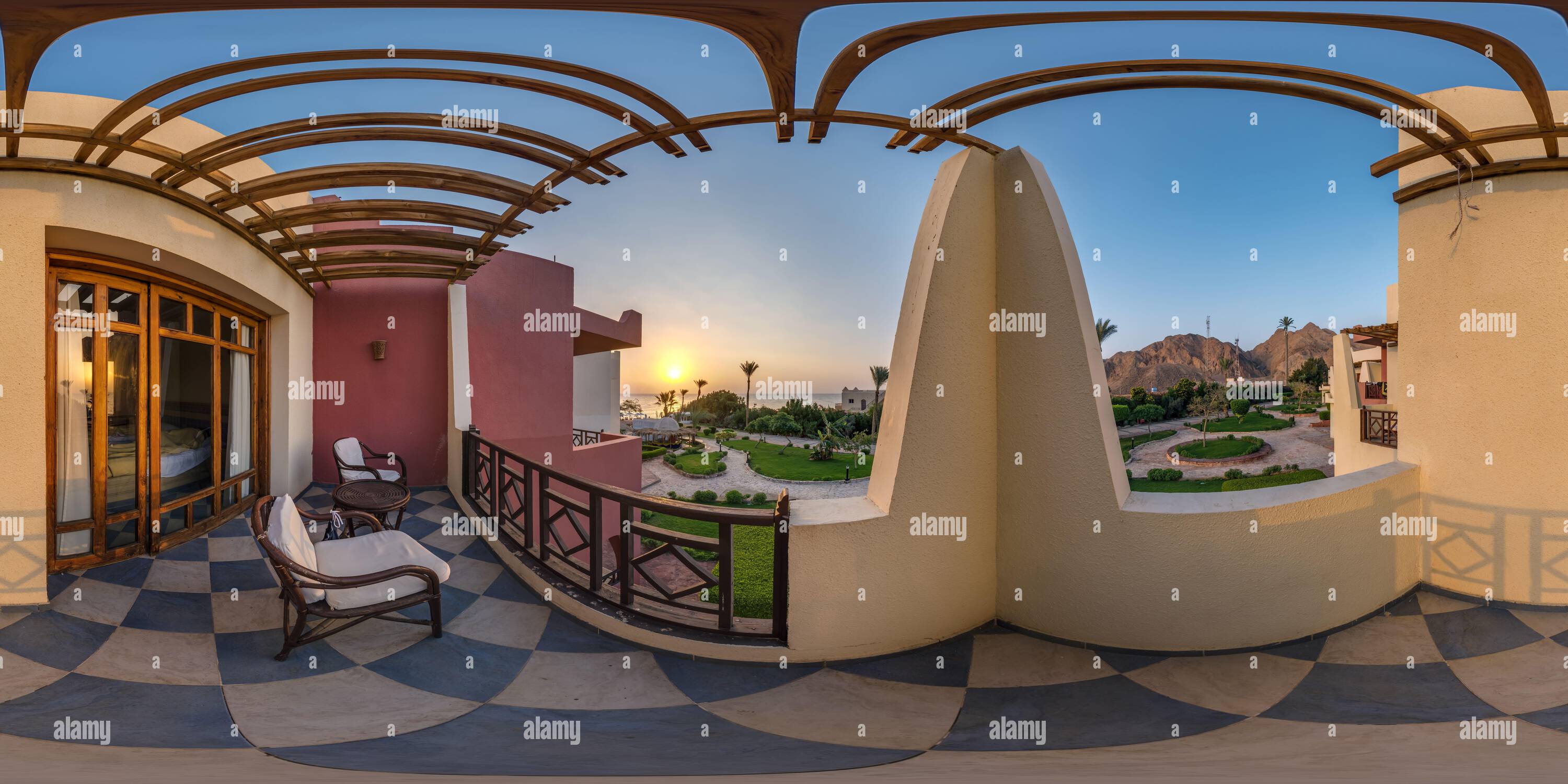 360 degree panoramic view of full seamless spherical hdri 360 panorama view on second floor of balcony or terrace overlooking sunrise or sunset overlooking the sea and palm trees