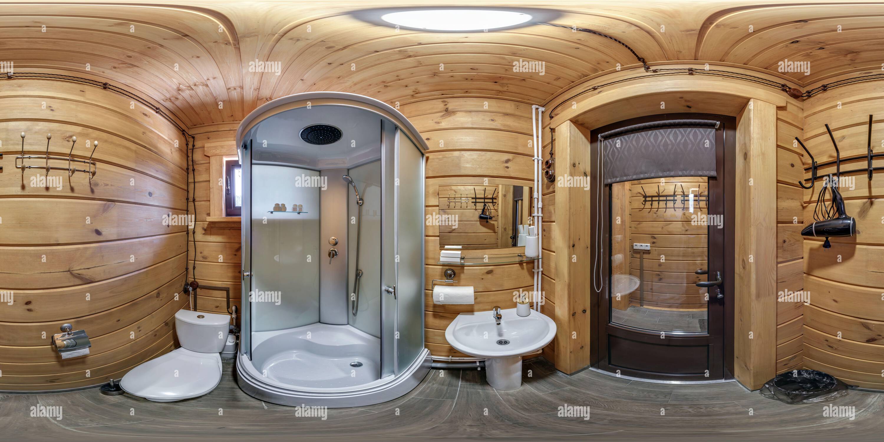 360 degree panoramic view of seamless 360 hdri panorama in interior of wooden bathroom in rustic style in  flat apartments with washbasin in equirectangular projection with zenith