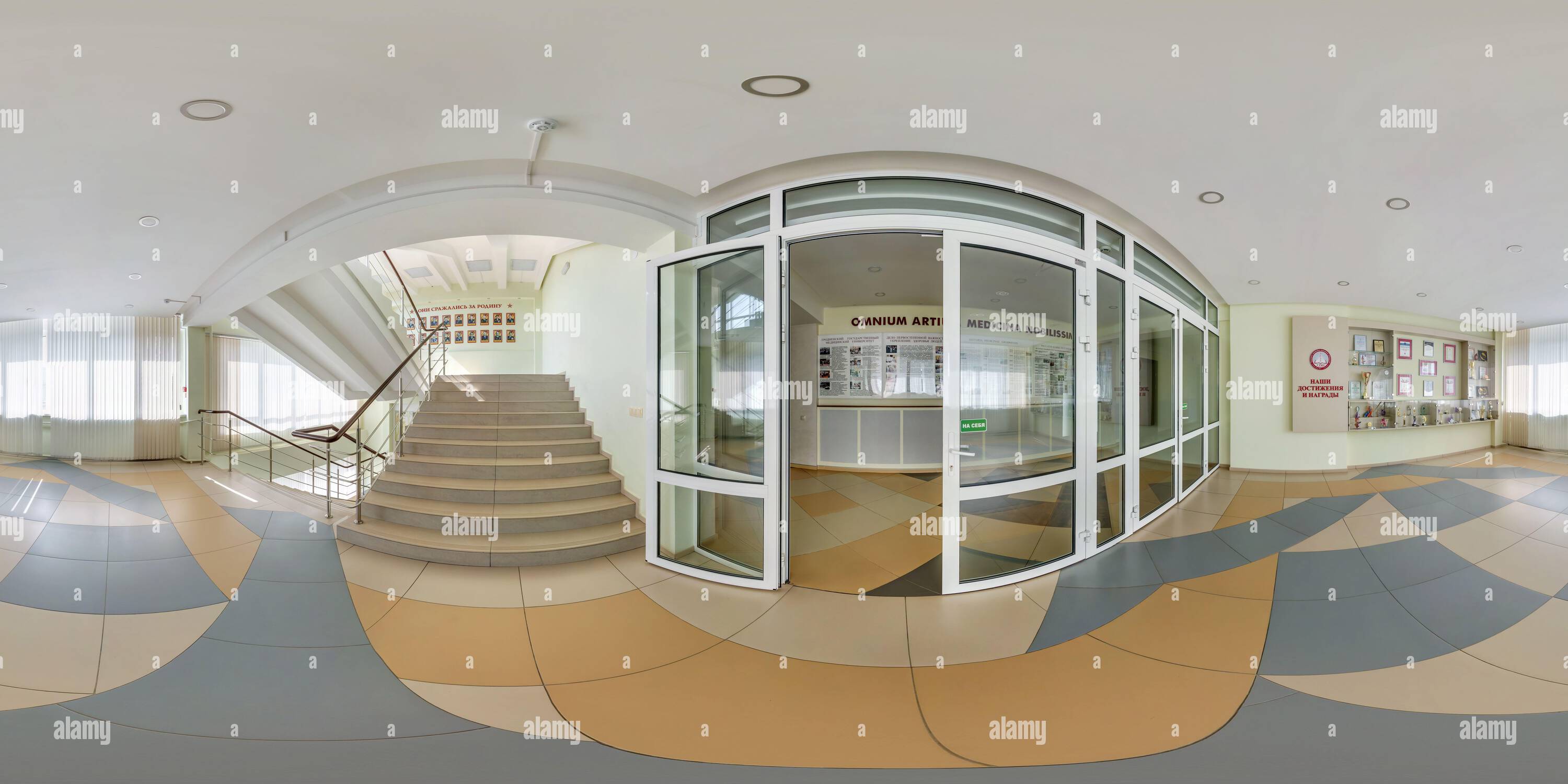 360 degree panoramic view of MINSK, BELARUS - MAY 2021: spherical seamless 360 hdri panorama in lobby or corridor of educational institution with emergency and evacuation exit sta