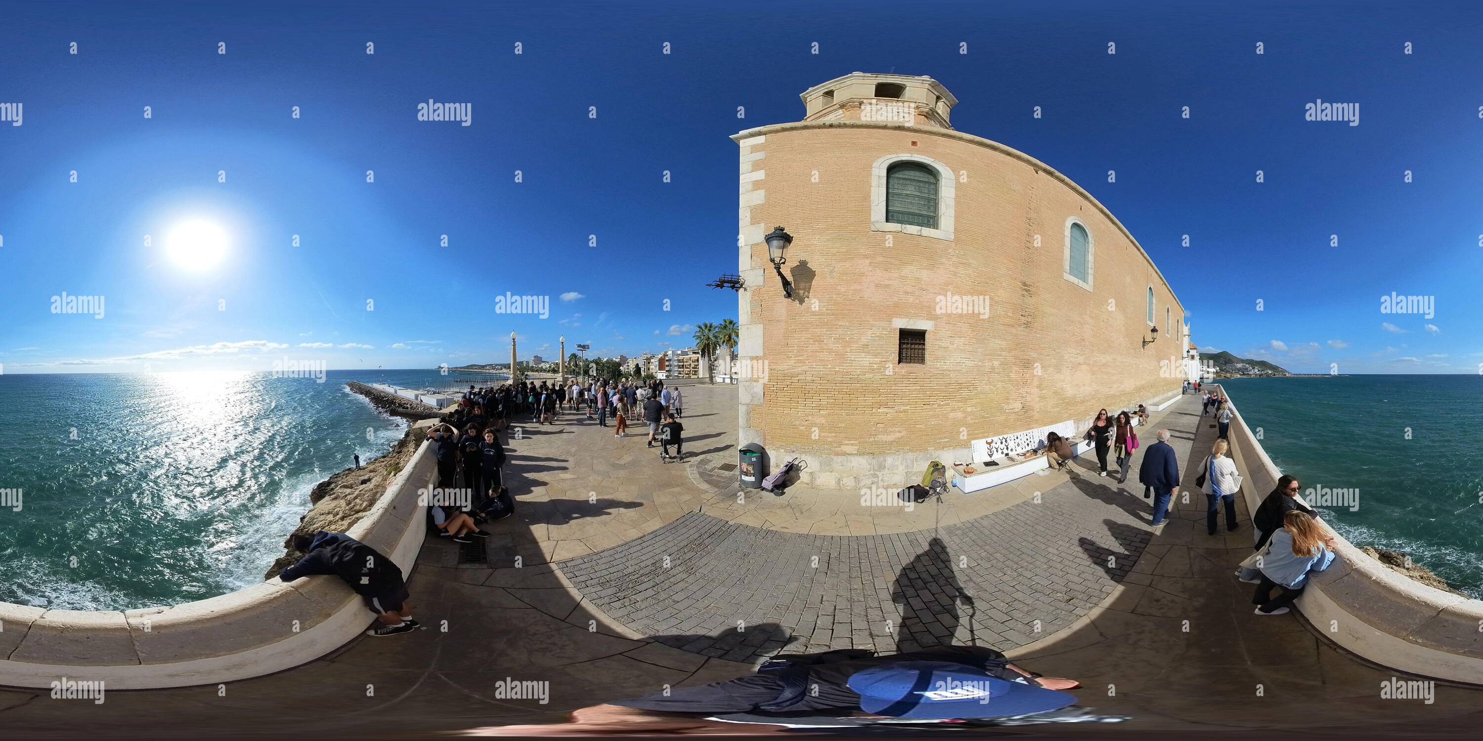 360 degree panoramic view of In Sitges, Spain near the Church of Sant Bartomeu and Santa Tecla.  Sitges is an old city on the shore of the Mediterranean Sea