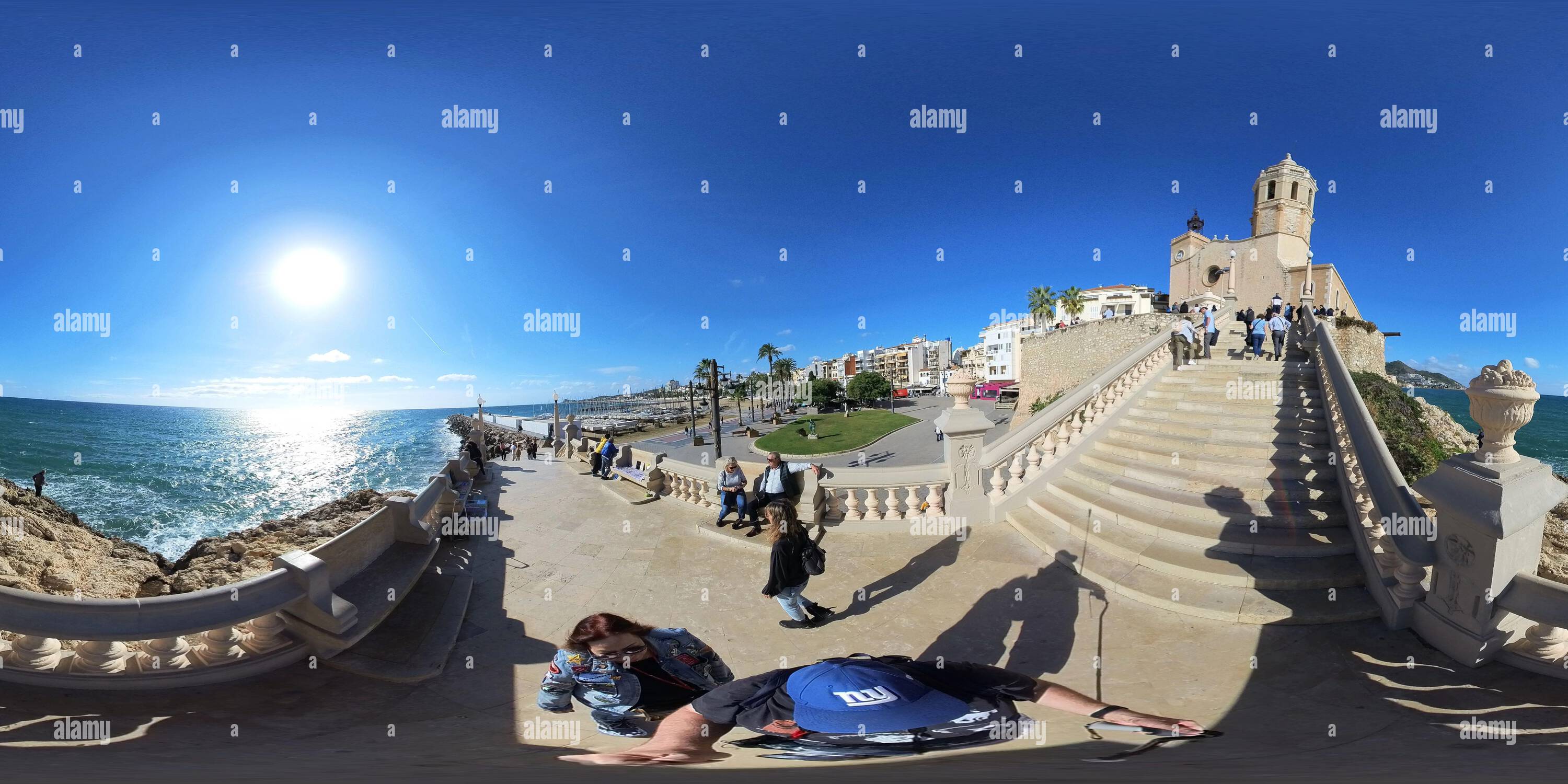 360 degree panoramic view of In Sitges, Spain near the Church of Sant Bartomeu and Santa Tecla.  Sitges is an old city on the shore of the Mediterranean Sea