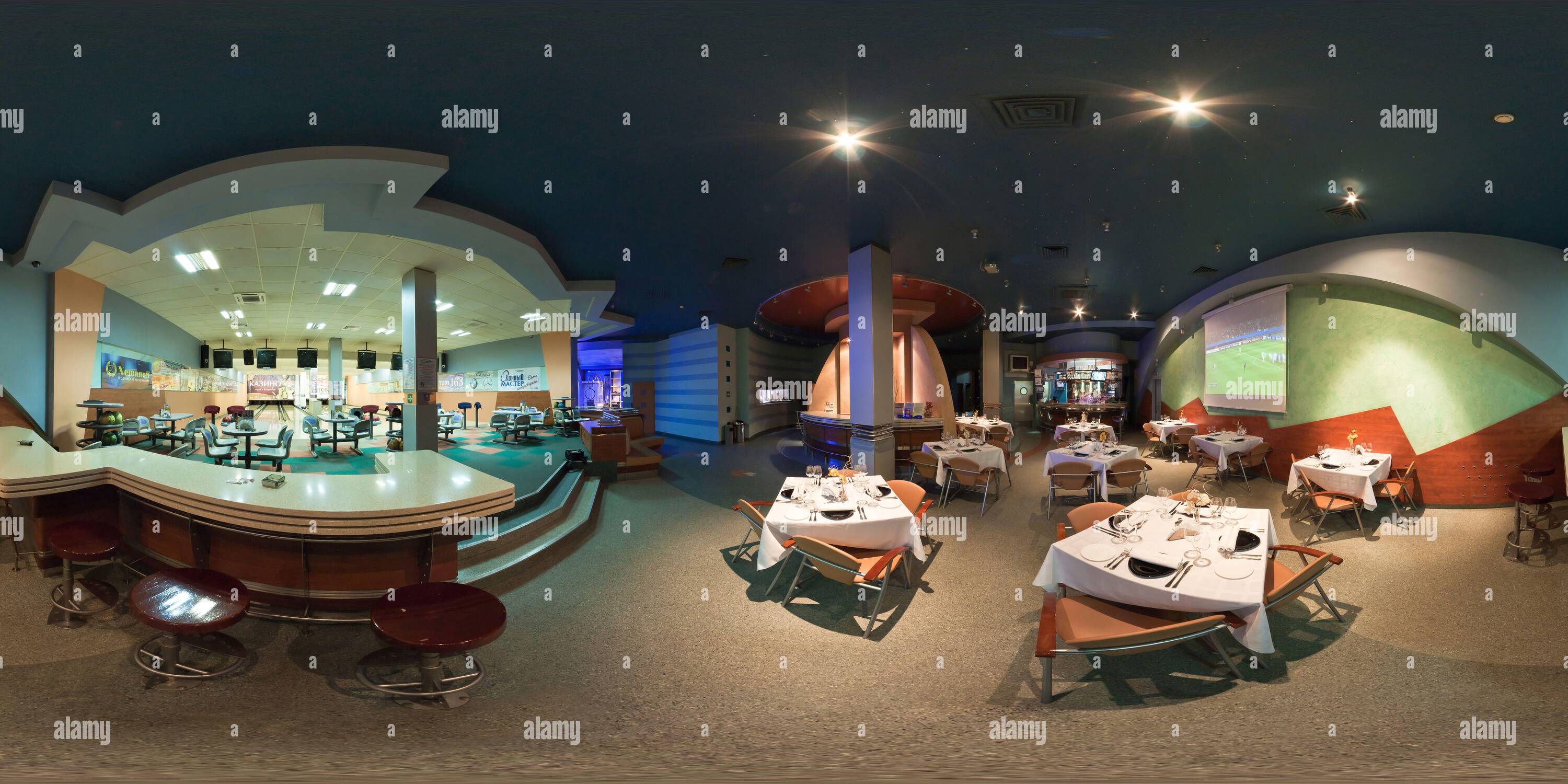 360 degree panoramic view of MINSK, BELARUS - MARCH ,2018: Panorama interior night bowling club with bar. Full spherical 360 by 180 degrees seamless panorama in equirectangular pr