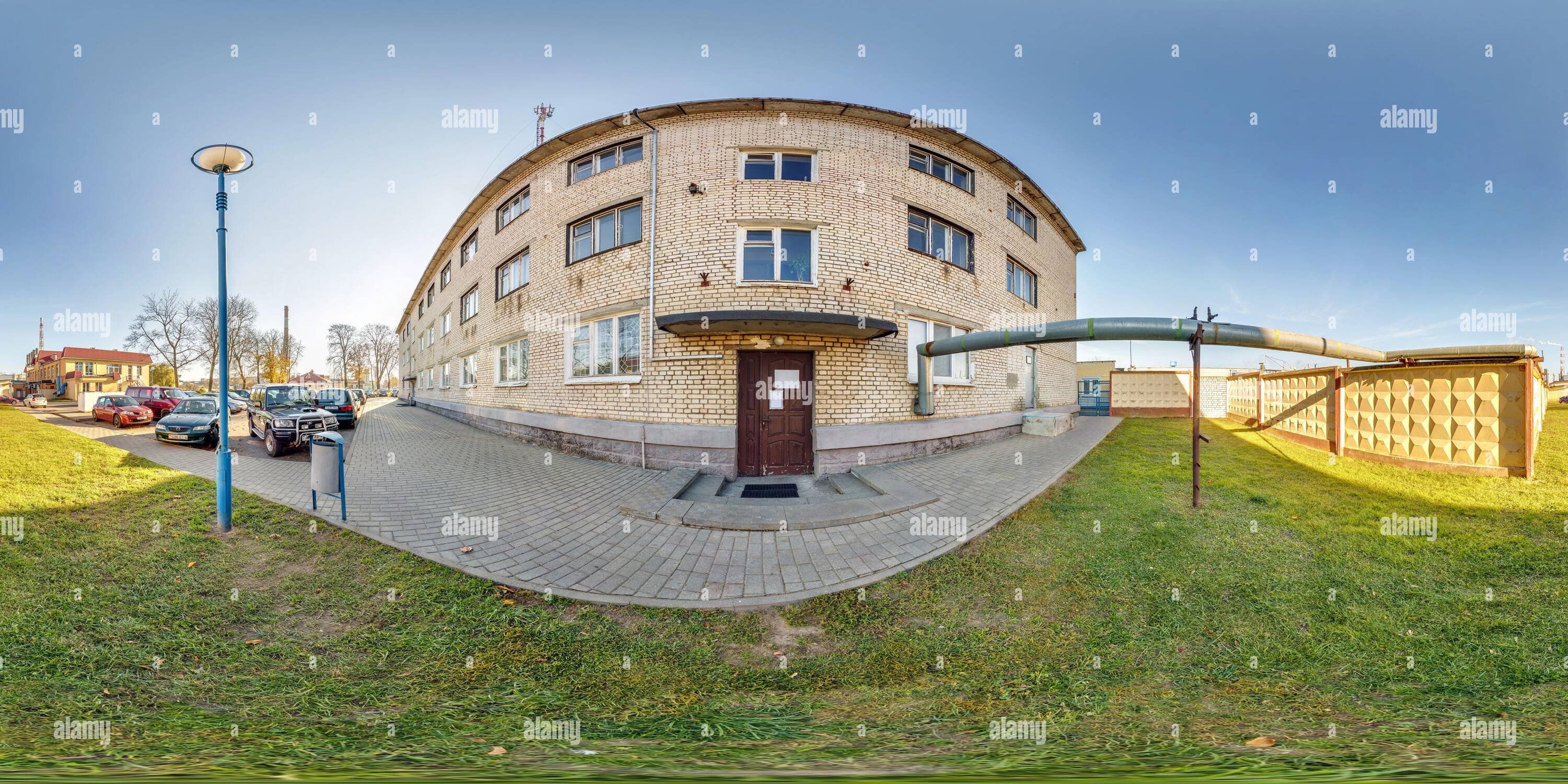 360 degree panoramic view of GRODNO, BELARUS - JULY 2021: full seamless spherical hdri panorama 360 view on crossroads street near multistory building area of urban development in
