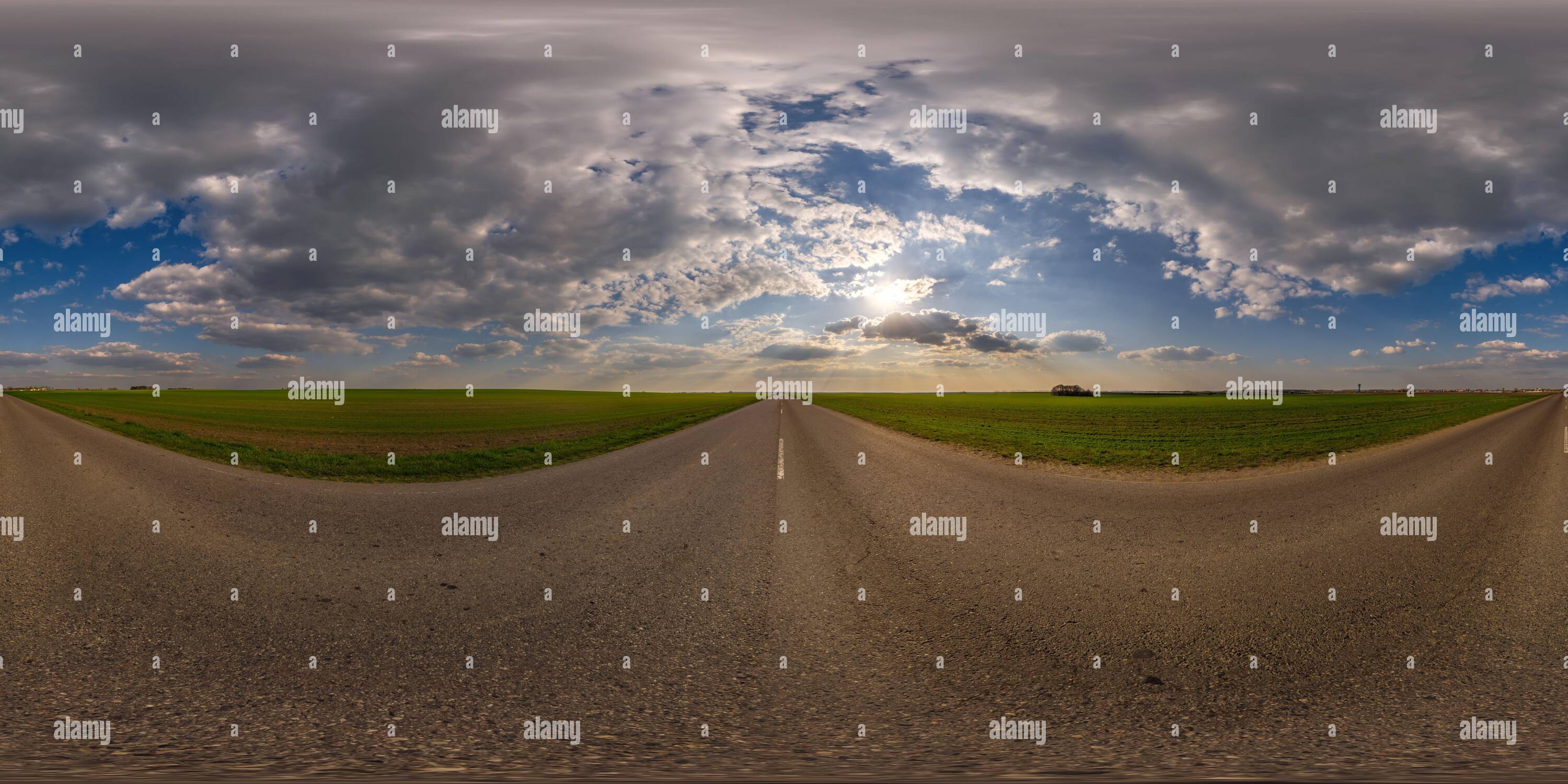 360° view of 360 hdri panorama near asphalt road with evening clouds on ...