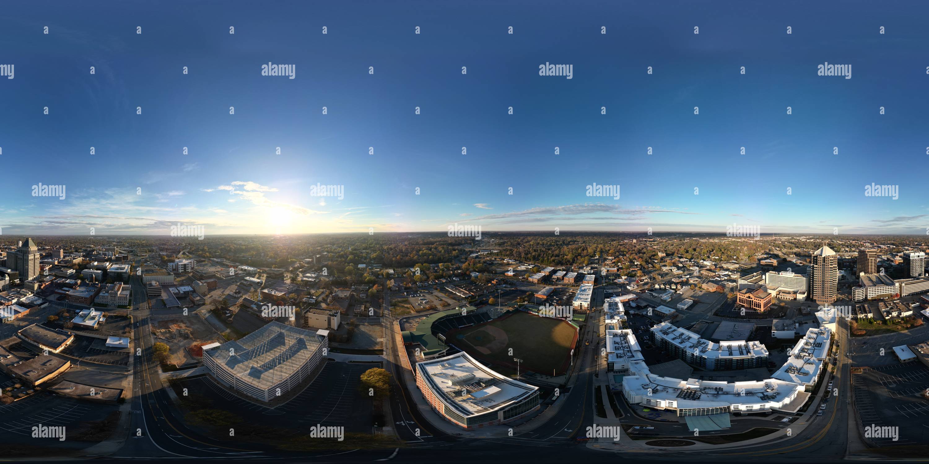 360° view of Above the streets of Greensboro, NC at golden hour - Alamy