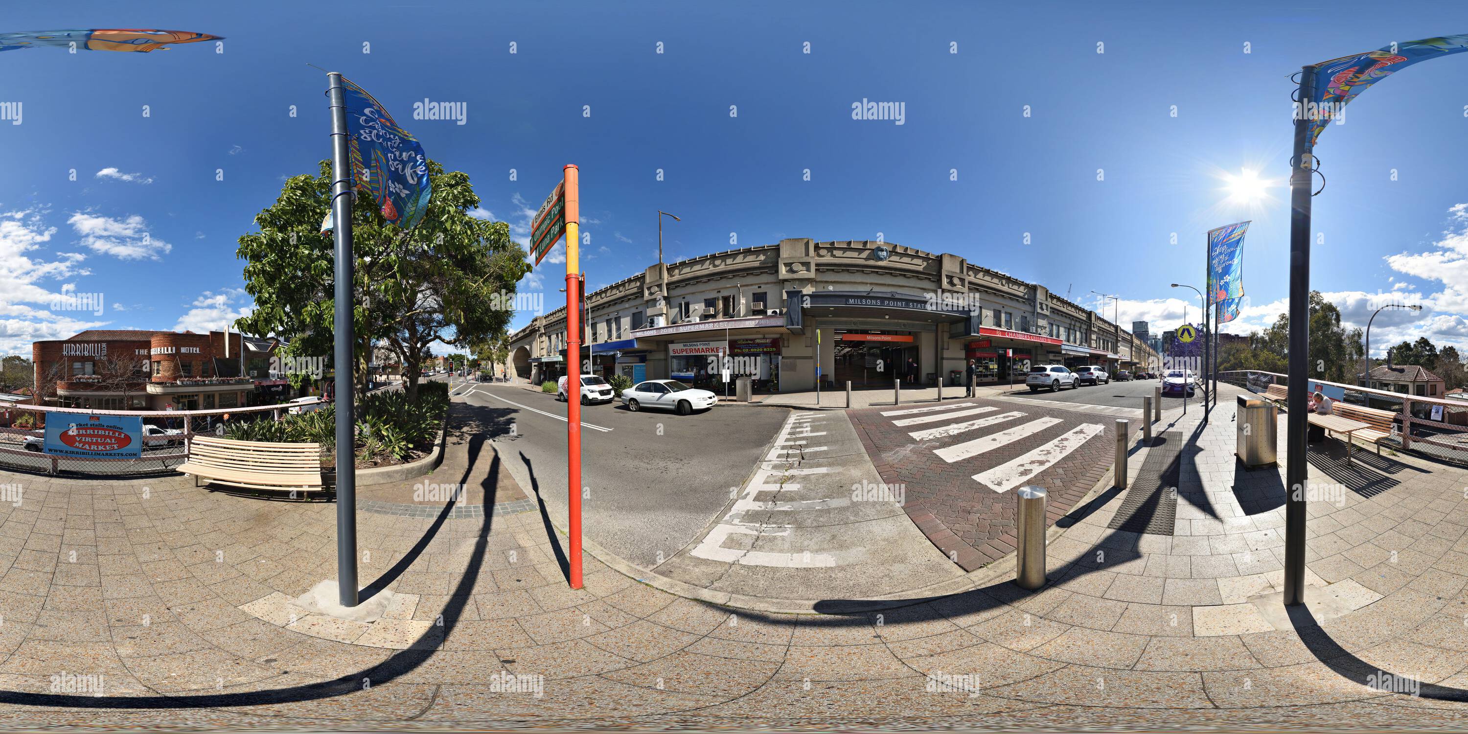 360 degree panoramic view of 360° panorama of the Milsons Point Station Entrance, local shops and The Kirribilli Hotel. Start here for Bridge Stairs walk into Sydney city.