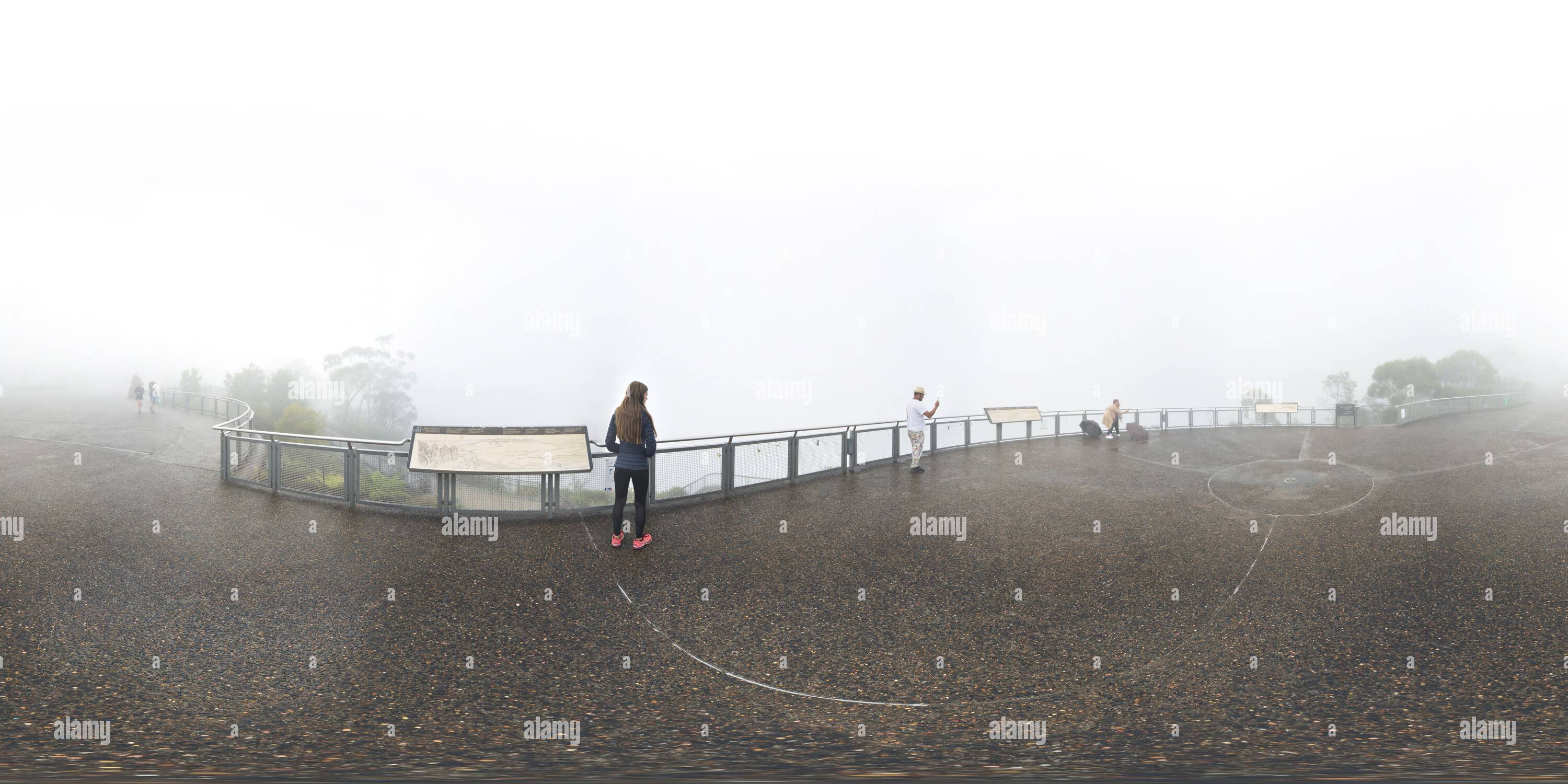 360 degree panoramic view of 360° Panorama of Echo Point Lookout Swathed In Fog, the only view of the Three Sisters is the view map on the scenic plaque Blue Mountains, Australia