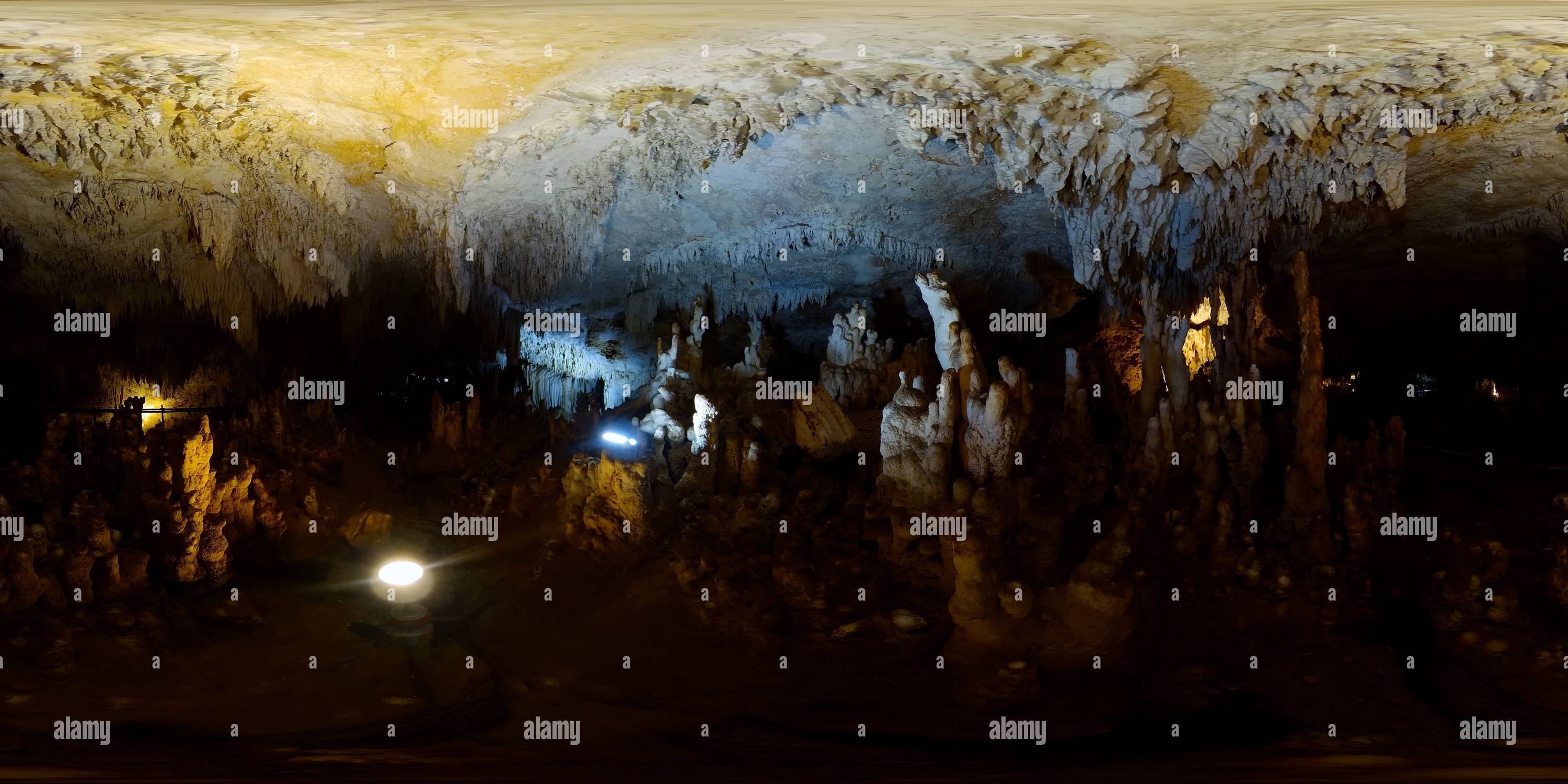 360 degree panoramic view of Stalactites and stalagmites in an underground cave.