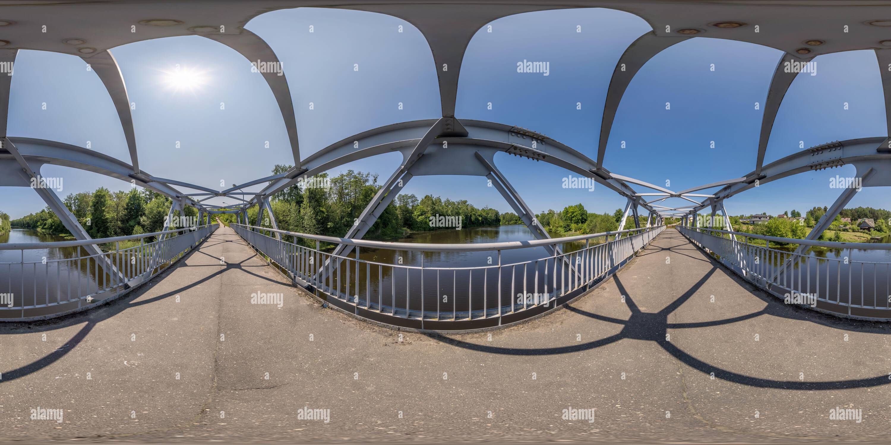 360 degree panoramic view of full seamless spherical 360 hdri panorama on iron steel frame construction of pedestrian bridge across the river in equirectangular projection, ready