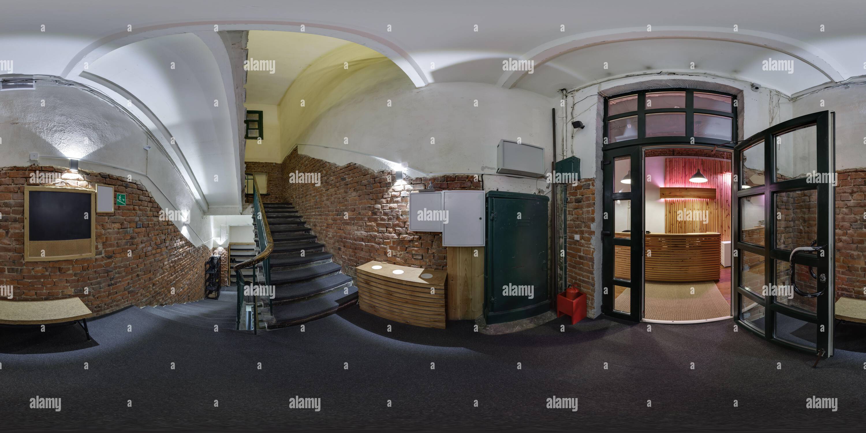 360 degree panoramic view of 360 hdri panorama in loft reception near emergency and evacuation exit stair in red bricks wall corridor in full seamless spherical equirectangular pr