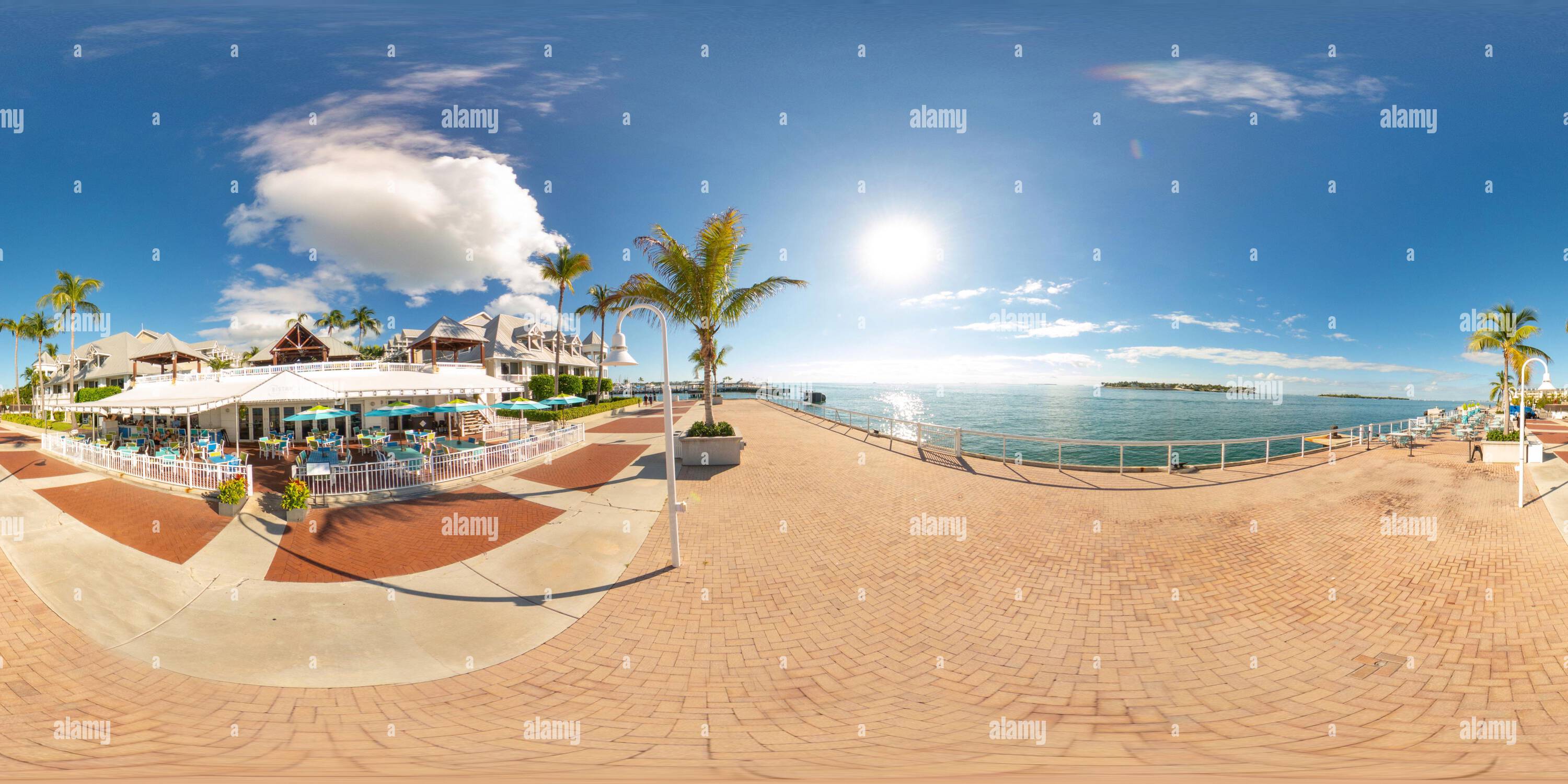 360 degree panoramic view of Key West, FL, USA - October 21, 2023: Bistro 245 waterfront restaurant at Mallory Square Key West 360 equirectangular stock photo