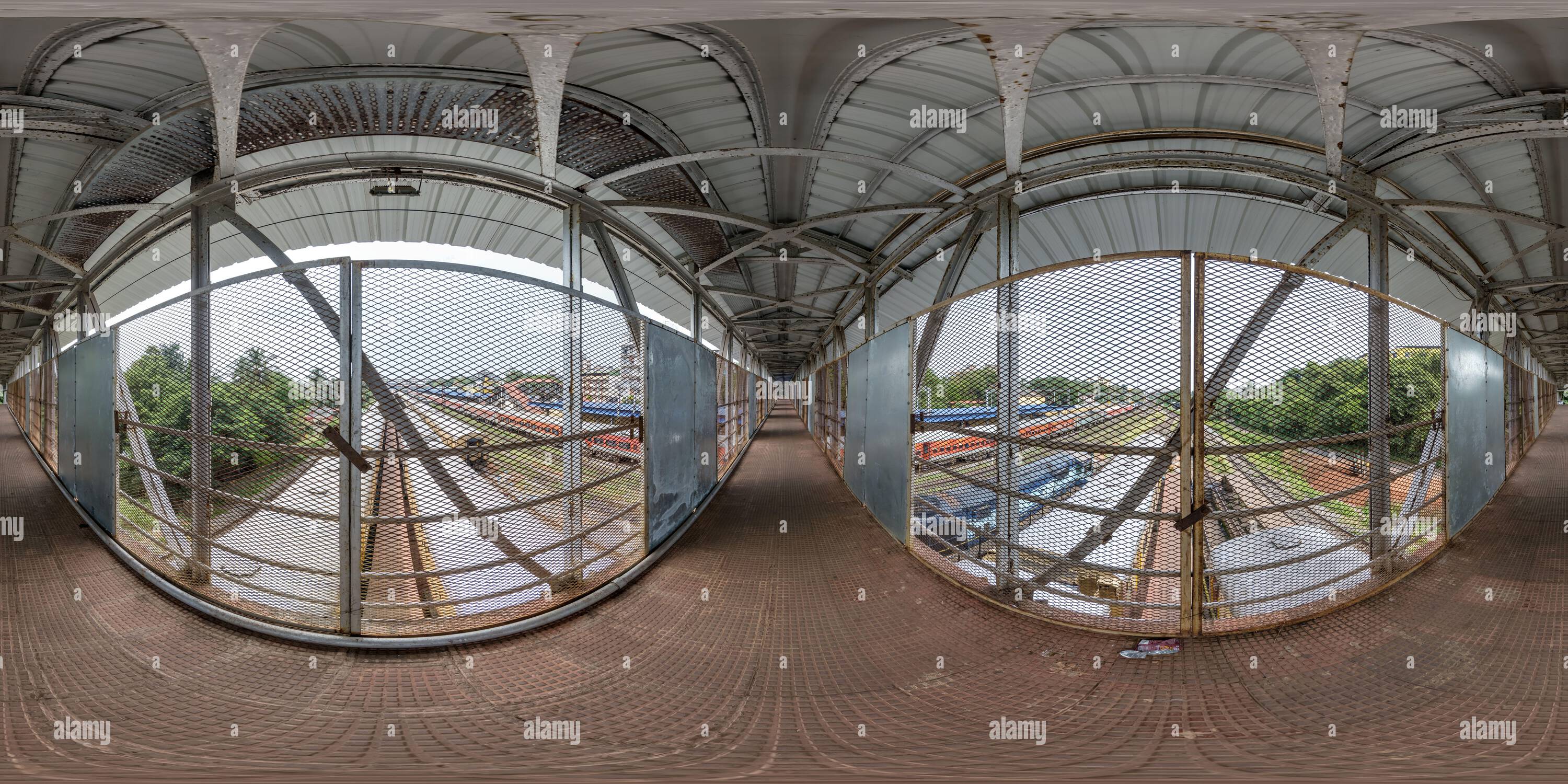 360 degree panoramic view of full seamless spherical 360 hdri panorama on iron steel frame construction of pedestrian crossing over the railway in equirectangular projection, read
