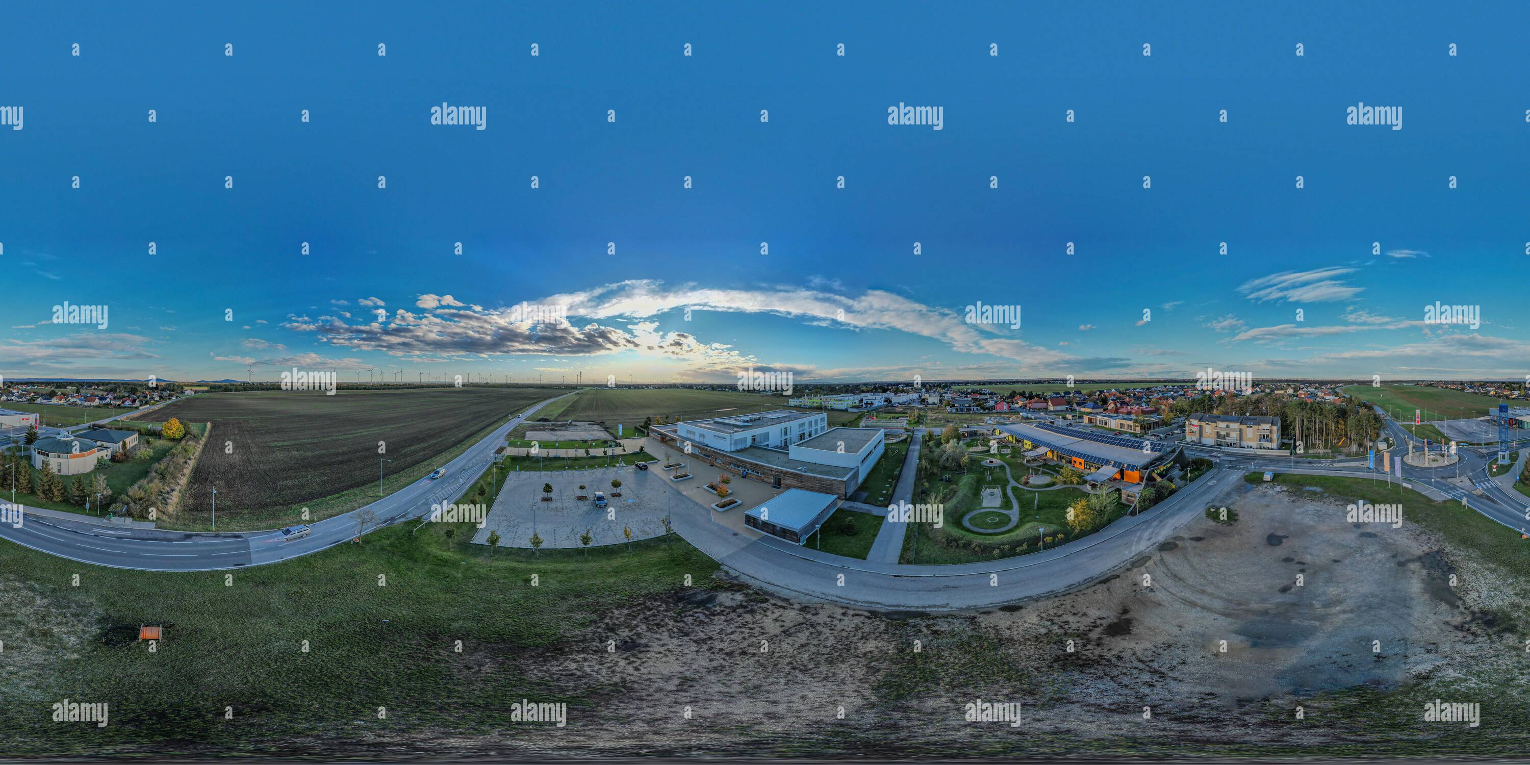 360 degree panoramic view of 360 Grad Volksschule Gänserndorf Süd Kindergarten Wolkenschiff Luftbild Luftaufnahme