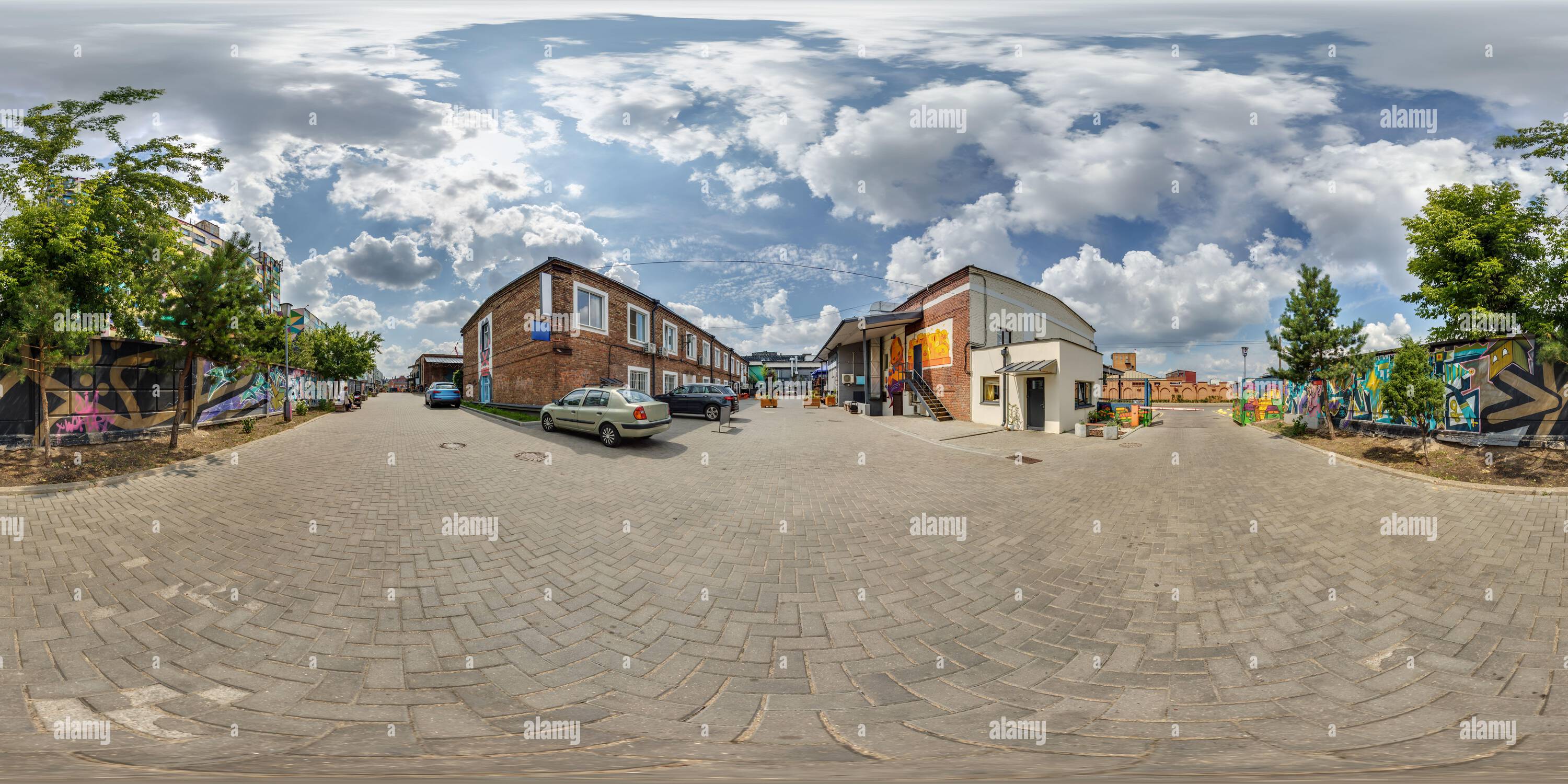 360 degree panoramic view of MINSK, BELARUS -  AUGUST 15, 2023: full seamless spherical hdri 360 panorama near old houses in narrow courtyard or backyard of city bystreet in equir