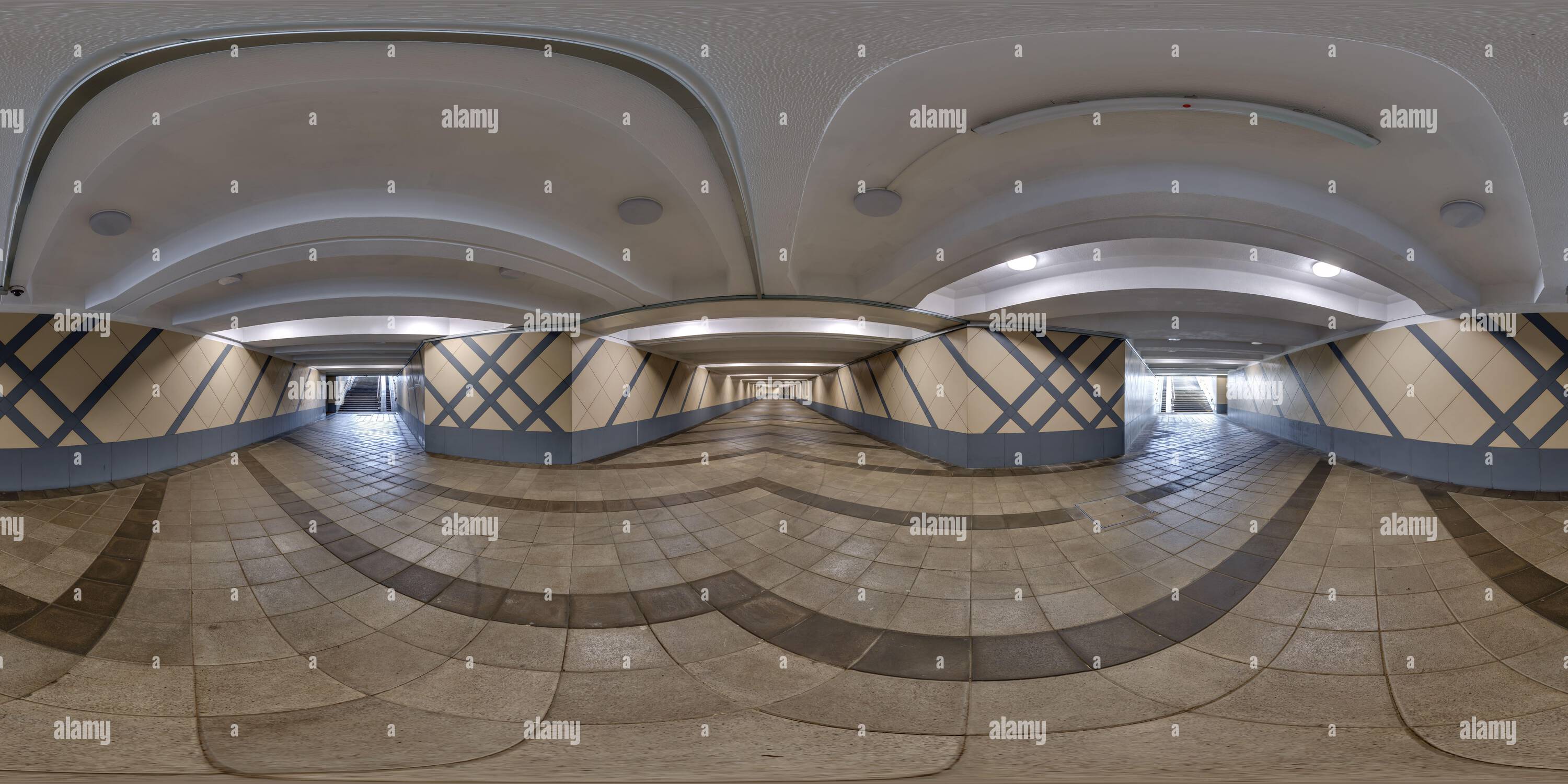 360 degree panoramic view of hdri 360 panorama view on pedestrian footpath inside long corridor of underground tunnel in equirectangular spherical seamless projection. VR AR conte