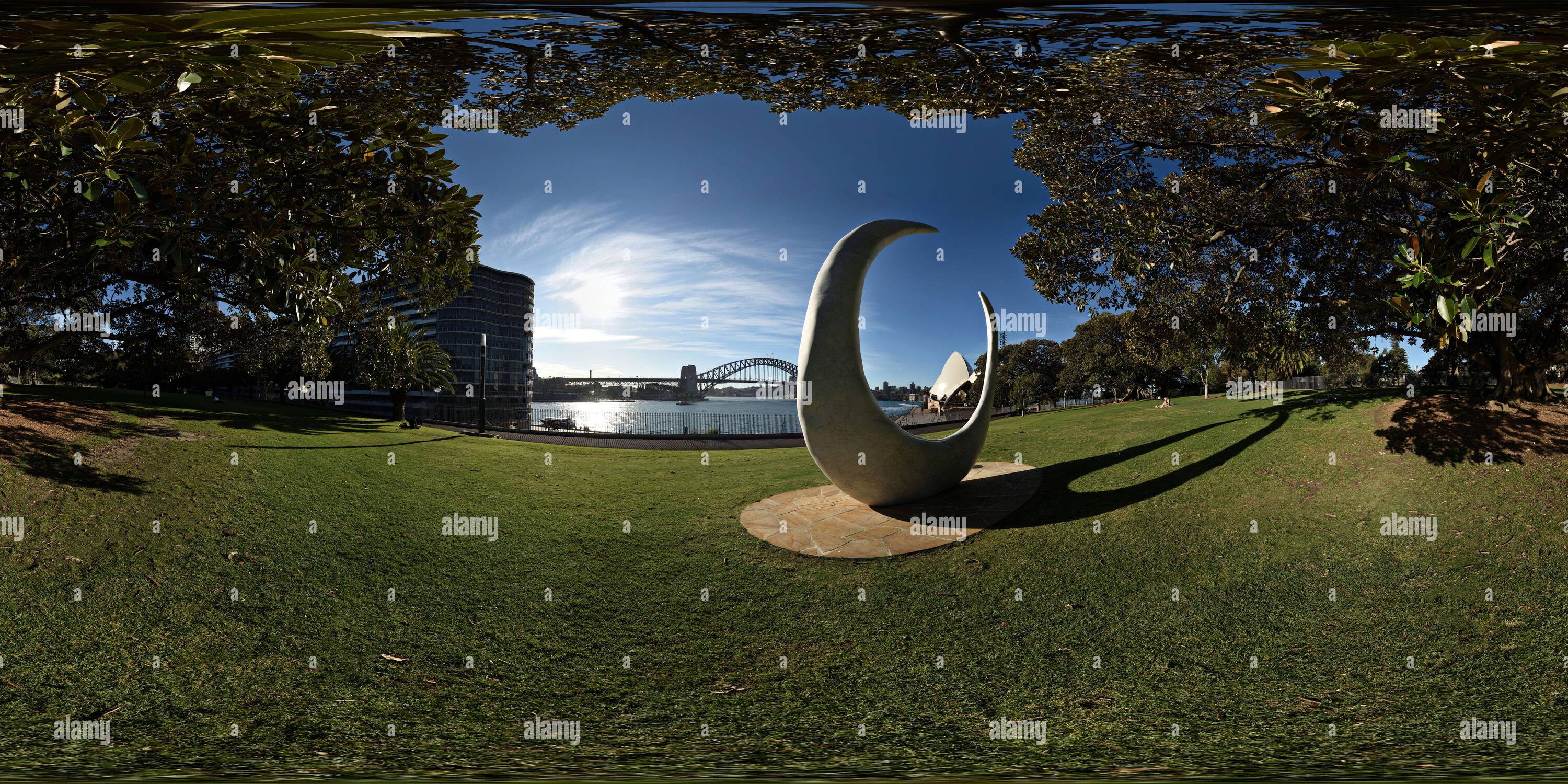 360 degree panoramic view of Sydney Opera House framed by 'bara' sculpture by Judy Watson on the Tarpeian Lawn with views to the Harbour Bridge, Circular Quay Australia