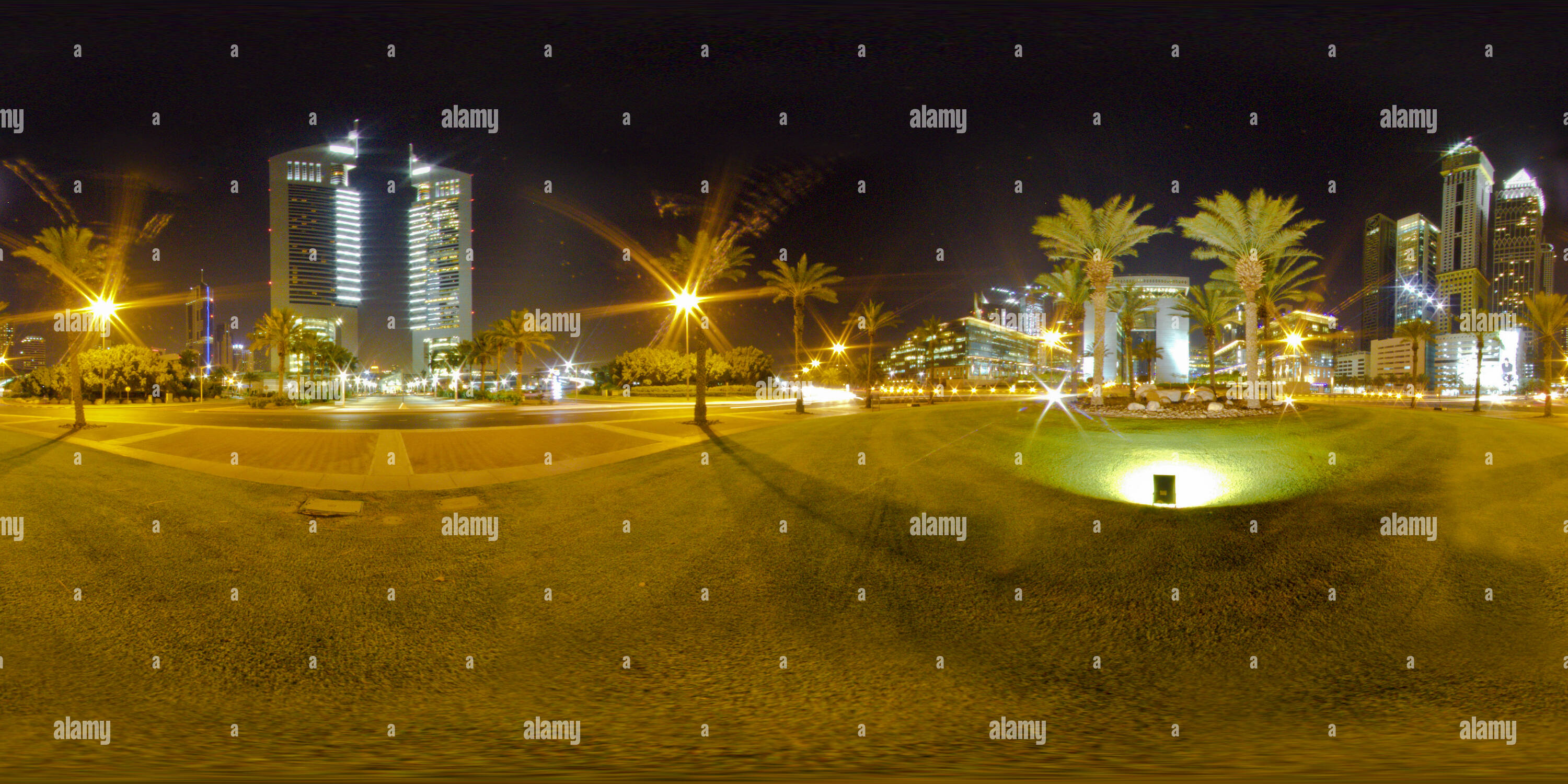 360° view of Night at the Emirates Towers and DIFC Alamy