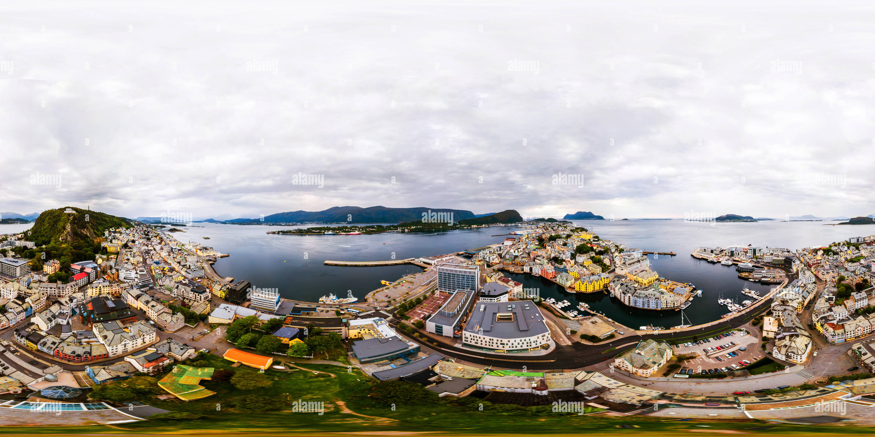 360 degree panoramic view of Alesund, Norway. Aerial view of Alesund, Norway in the morning. Cloudy sky over famous tourisitc destination with sea and mountains