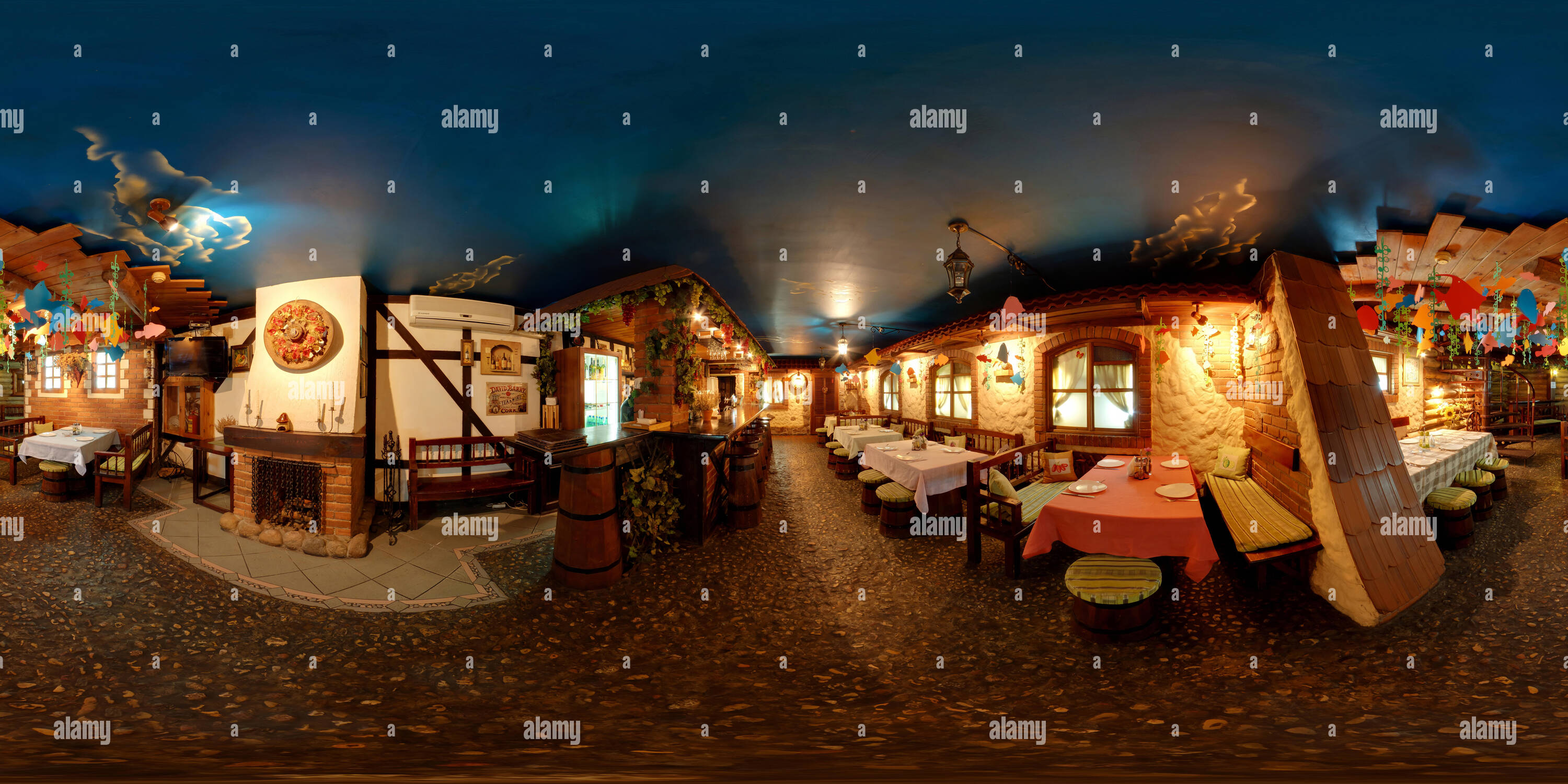 360 degree panoramic view of MINSK, BELARUS - APRIL 20, 2011: Full 360 degree panorama in equirectangular spherical projection of cafe in vintage folk style.
