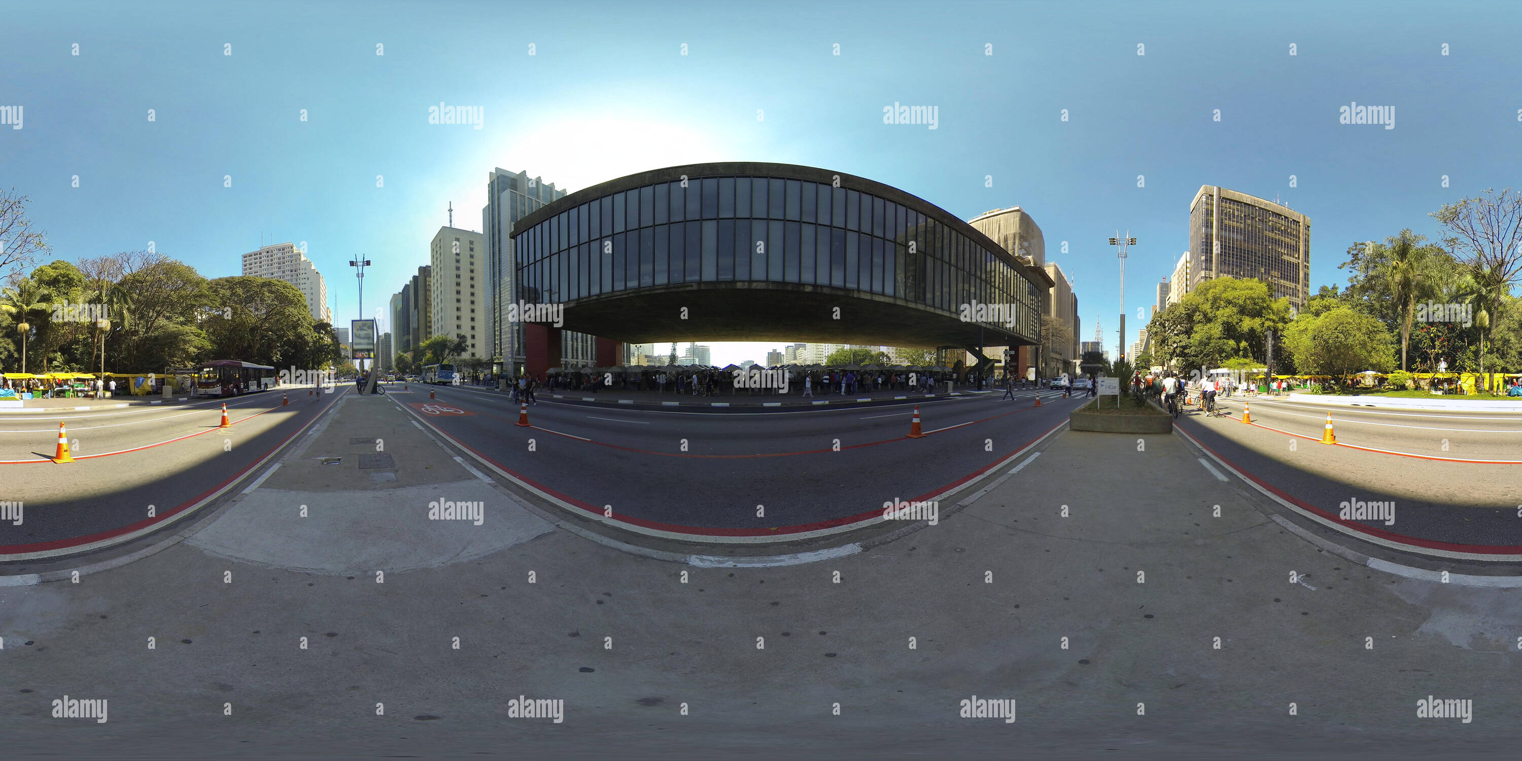 360 degree panoramic view of SAO PAULO, BRAZIL: People and cyclists stroll along Avenida Paulista near the Museum of Art (MASP). 360 photo vr panorama