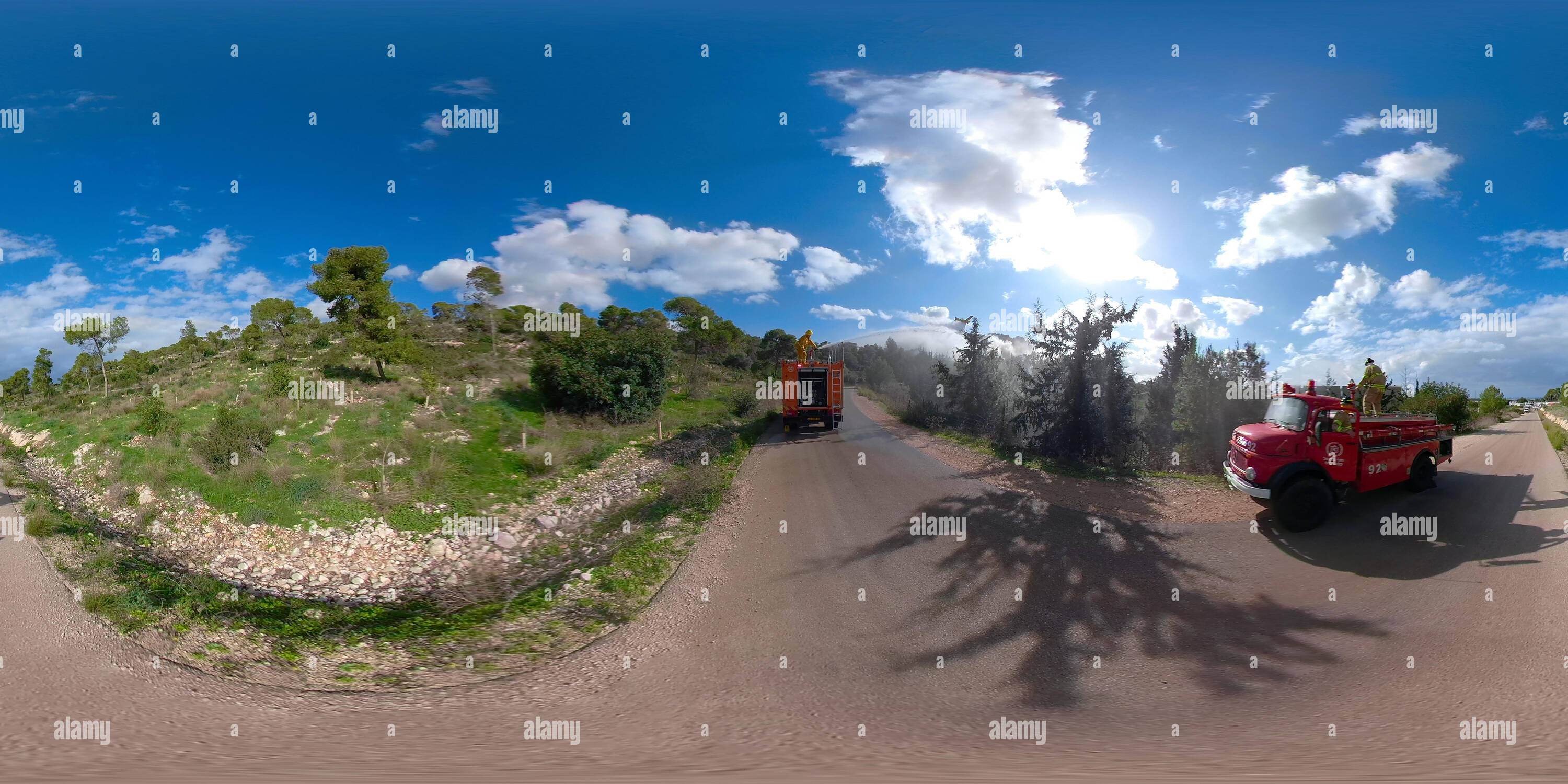 360° view of Firefighting airtanker drop fire retardant on burning ...