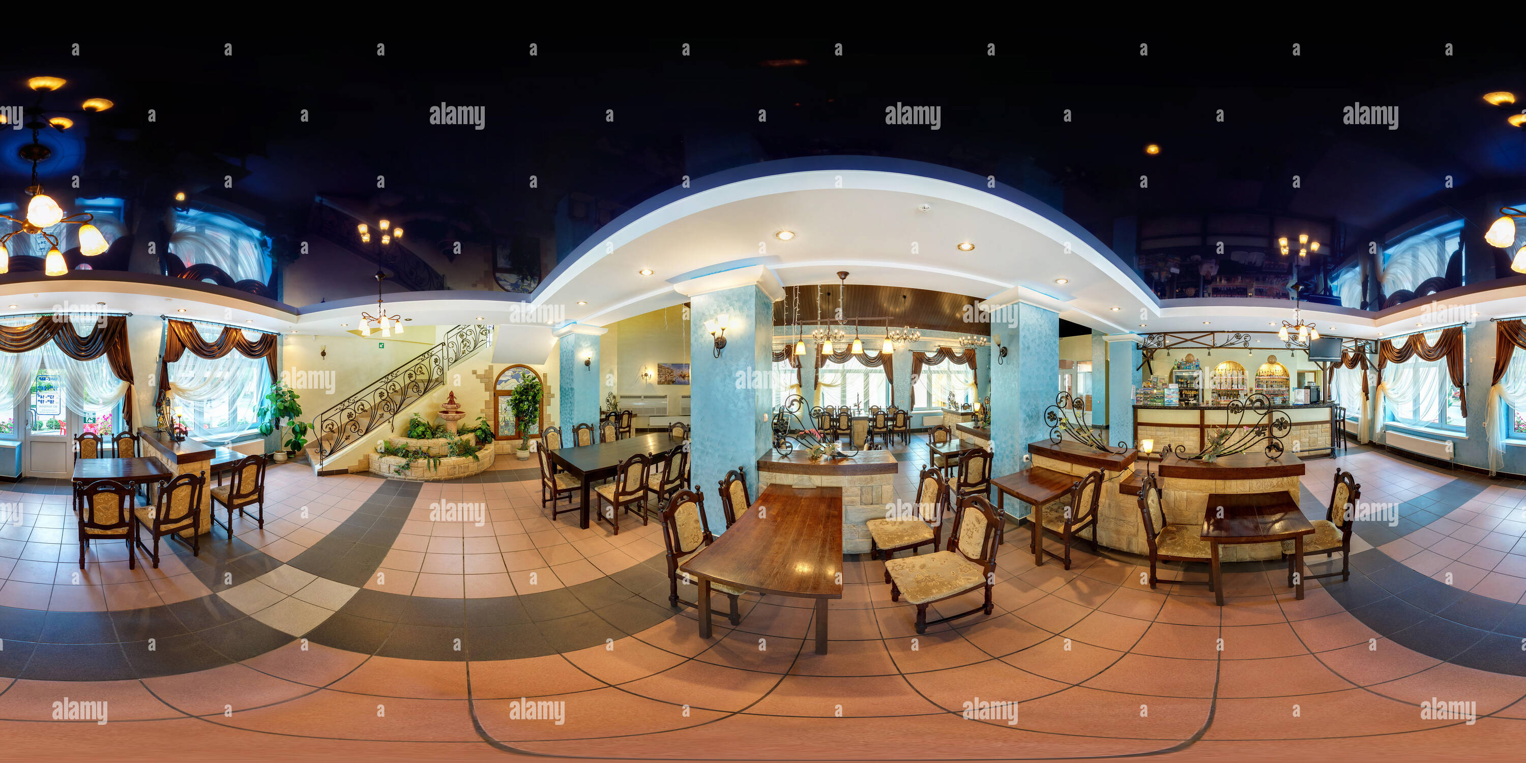 360 degree panoramic view of GRODNO, BELARUS - JULY 5, 2013: Panorama in interior of stylish modern cafe with stairs. Full 360 by 180 degree seamless  panorama  in equirectangular
