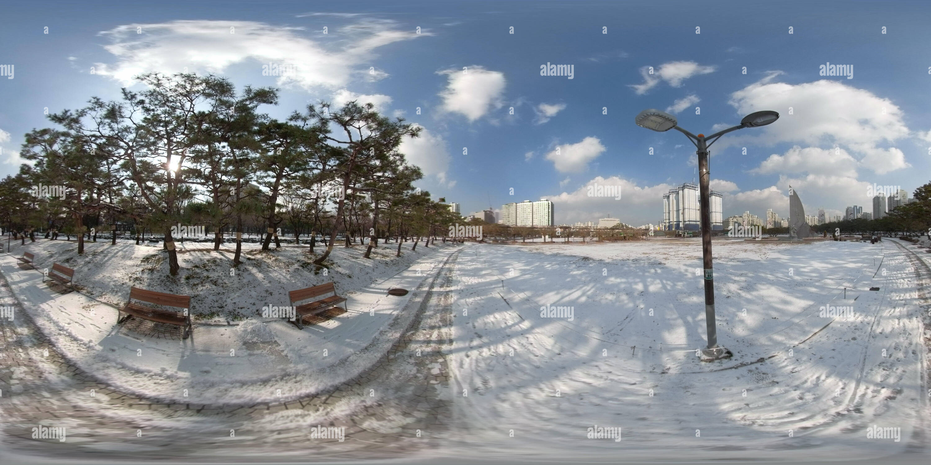 360 degree panoramic view of BUCHEON, SOUTH KOREA - December 13, 2018:  Panorama 360 degrees angle view of snow-covered park on a sunny day.