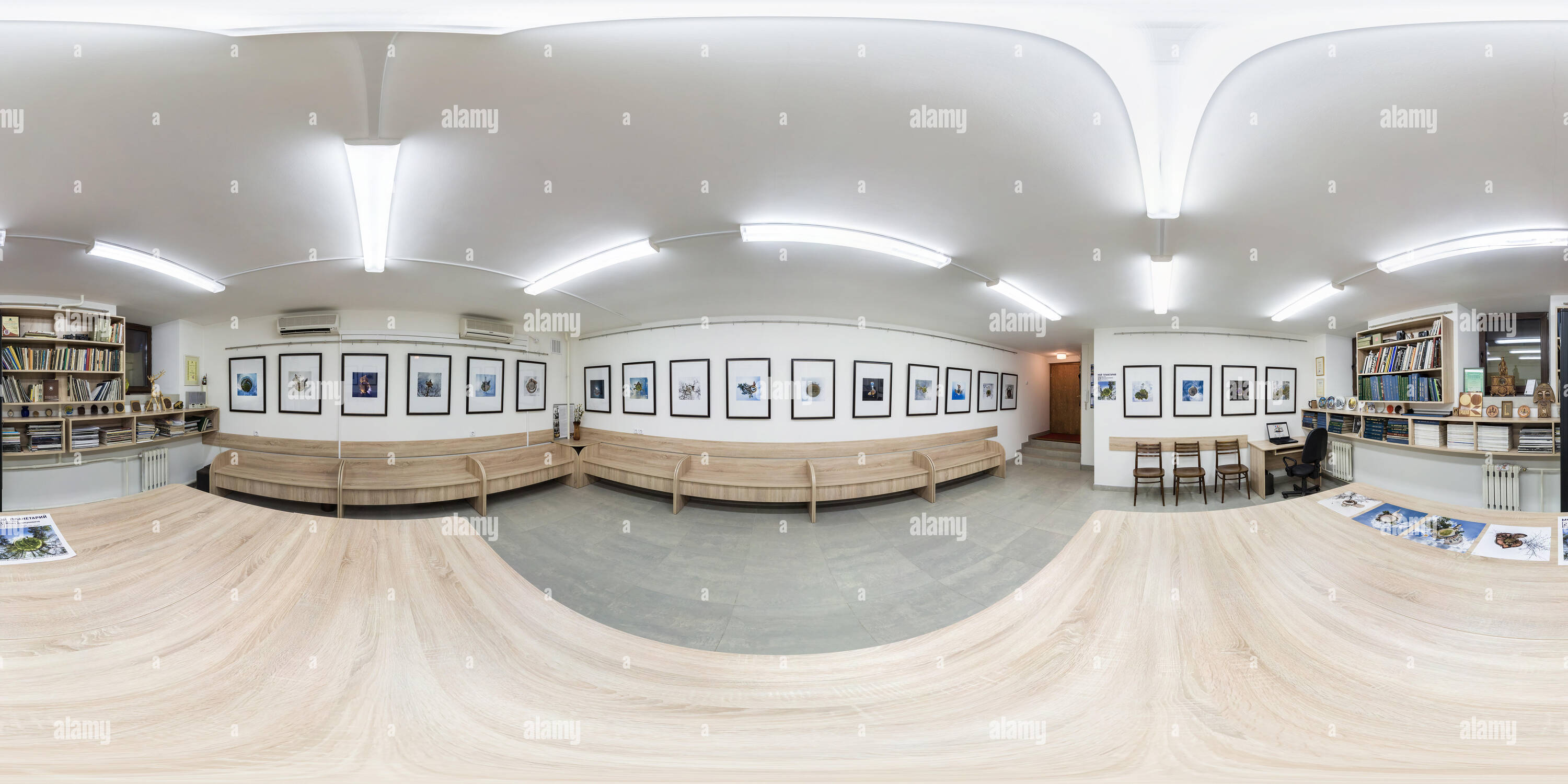 360 degree panoramic view of GRODNO, BELARUS - MARCH 2, 2017: 360 panorama view in interior of art gallery with little planets pictures. Full 360 by 180 degrees seamless panorama