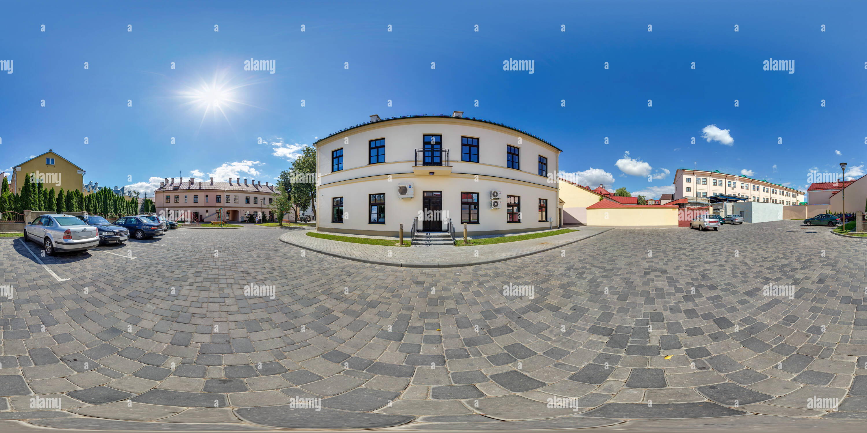 360 degree panoramic view of GRODNO, BELARUS - AUGUST 14, 2017: 360 panorama view in old town street courtyard exterior in sunny day, full 360 by 180 degrees angle panorama in equ