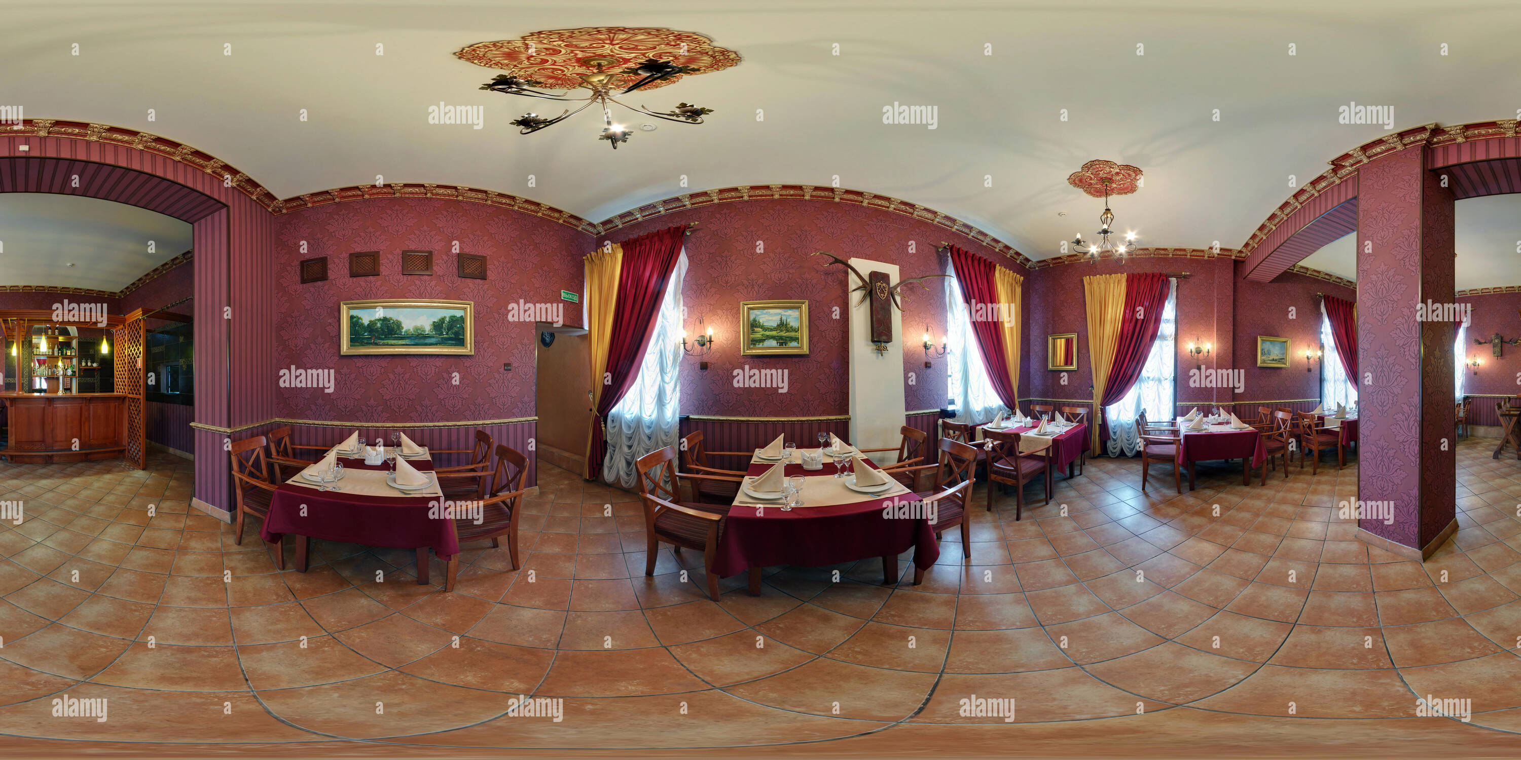 360 degree panoramic view of GRODNO , BELARUS - SEPTEMBER  11, 2011: 360 panorama view in interior of small stylish vintage cafe with red style, full 360 by 180 degrees angle pano