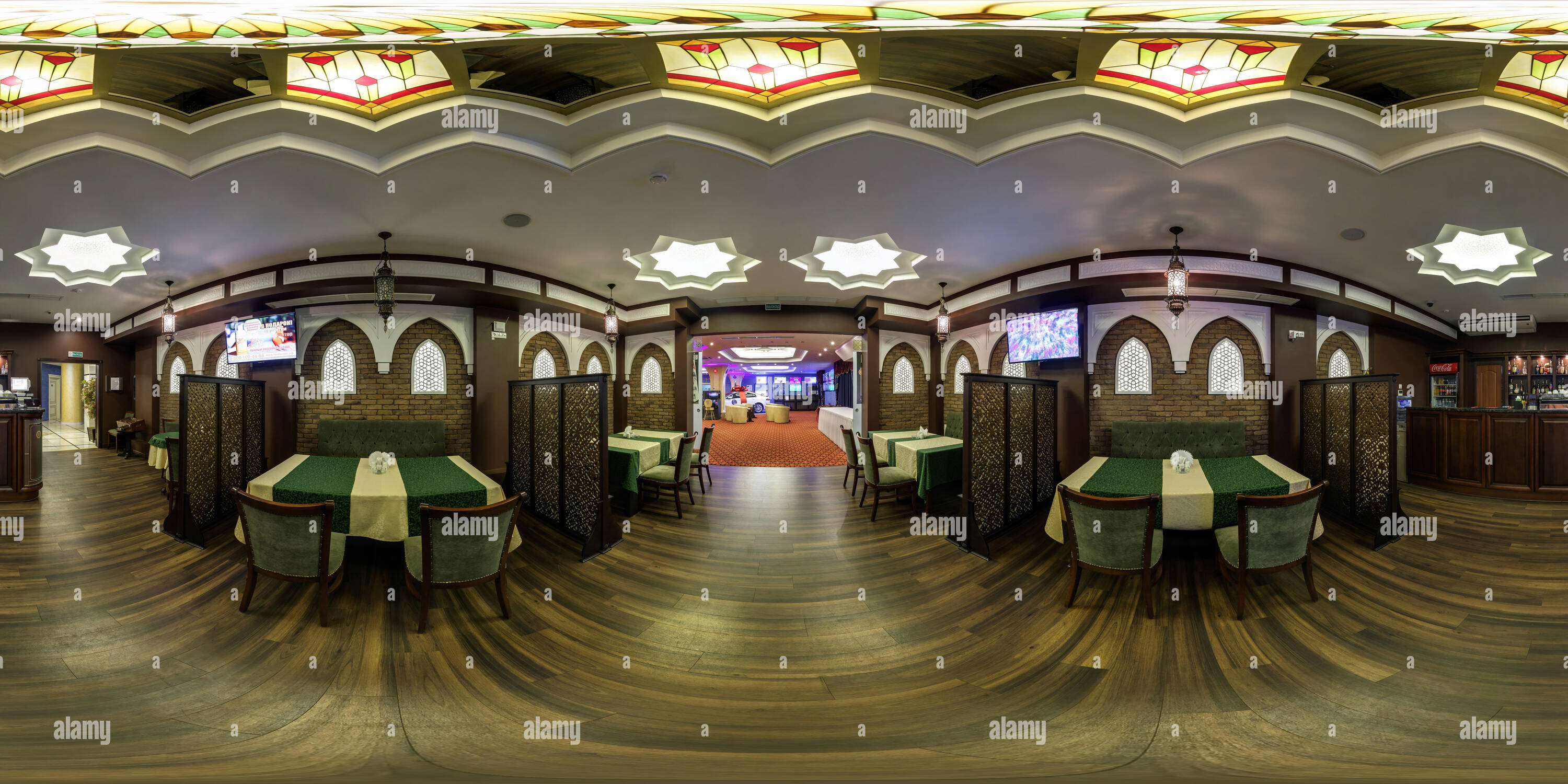 360 degree panoramic view of MINSK, BELARUS - JULY 25, 2014: 360 panorama in interior of elite stylish cafe in modern casino. Full 360 by 180 degree angle view seamless panorama i