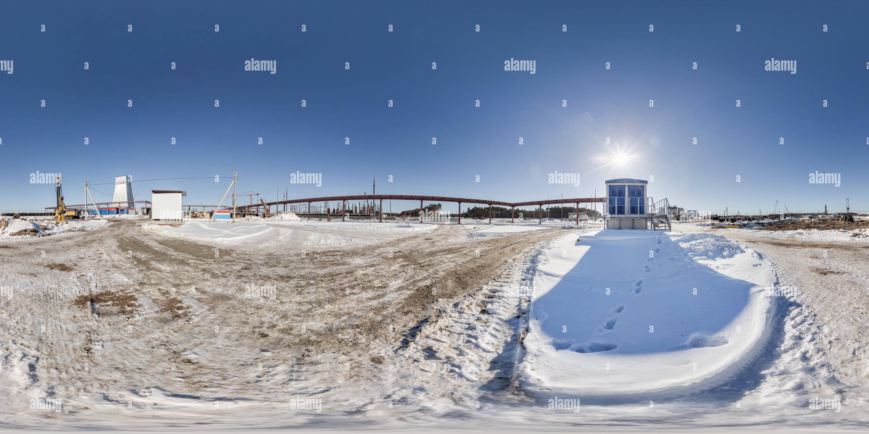 360 degree panoramic view of GOMEL, BELARUS - FEBRUARY, 2017: full seamless panorama 360 angle view in winter snow field place site construction of a mining plant in equirectangul