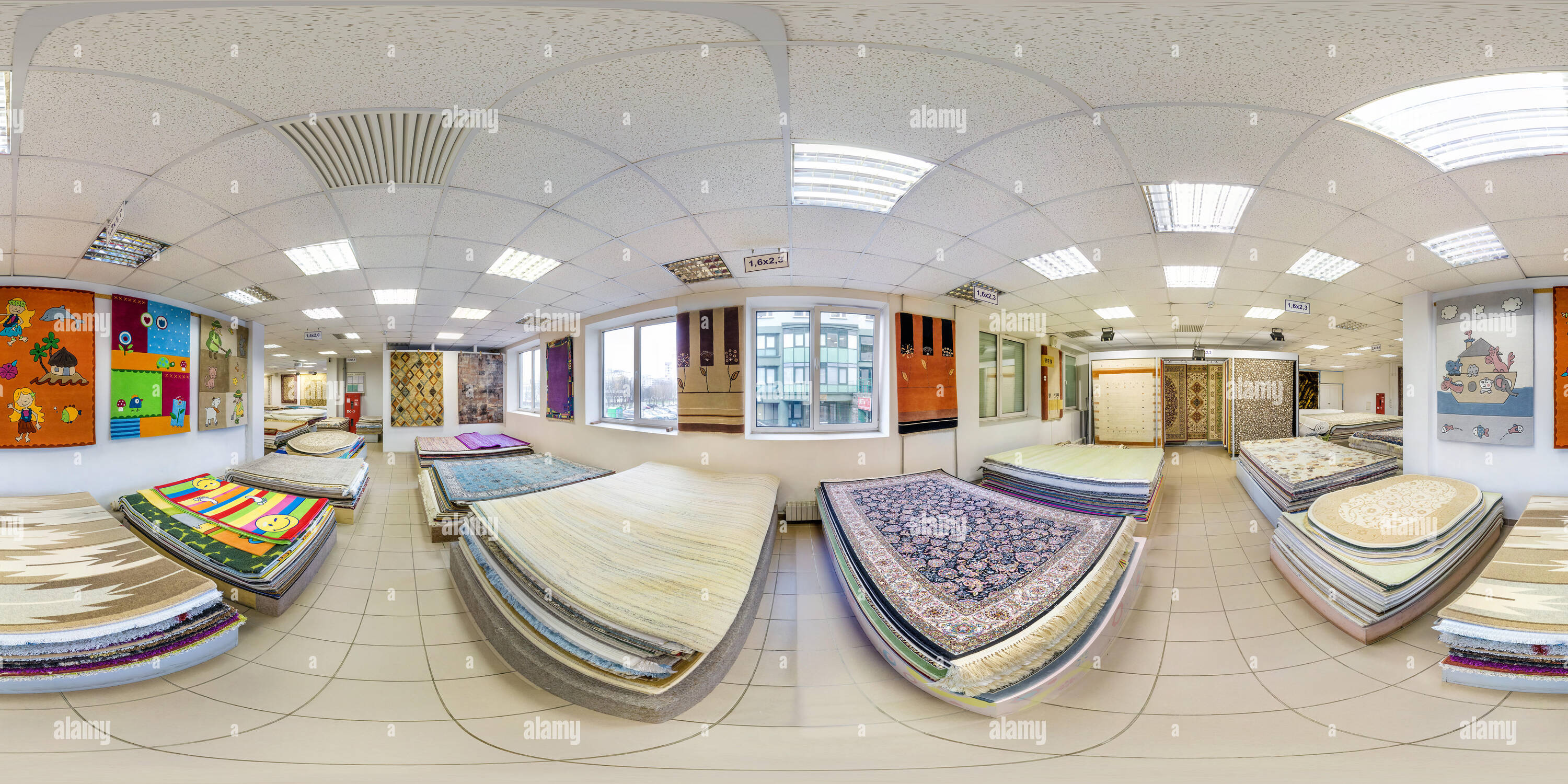 360 degree panoramic view of MINSK, BELARUS - MAY, 2017:  Full seamless panorama 360 by 180  angle degrees view inside interior of store machine knitted handmade carpets in equire