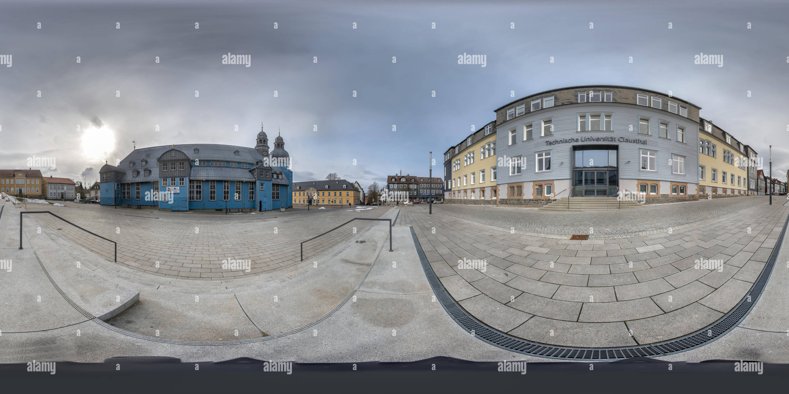 360 degree panoramic view of Clausthal-Zellerfeld, Germany, February 20, 2019: Center with the blue wooden church and the entrance of the main building of the Technical University