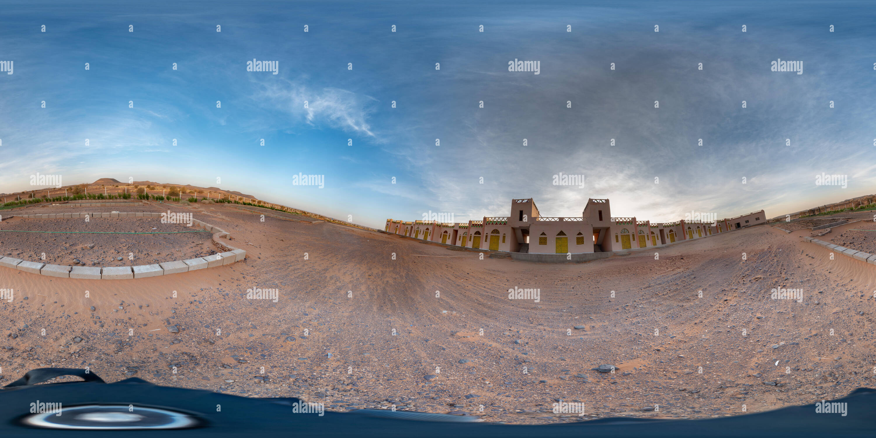 360 degree panoramic view of Meroe, Sudan, February 11, 2019: One-storey elongated hotel in the desert, lonely without guests, near the pyramids of Meroe