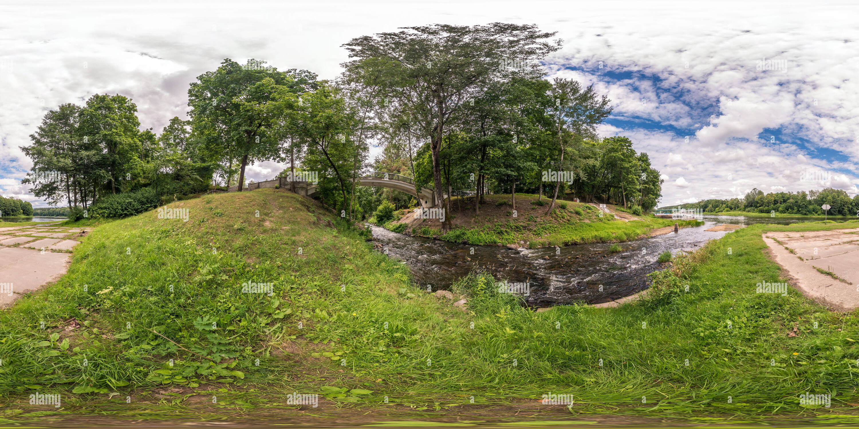 360 degree panoramic view of full seamless spherical panorama 360 by 180 degrees angle view on the shore of width river near the bridge in summer day in equirectangular projection