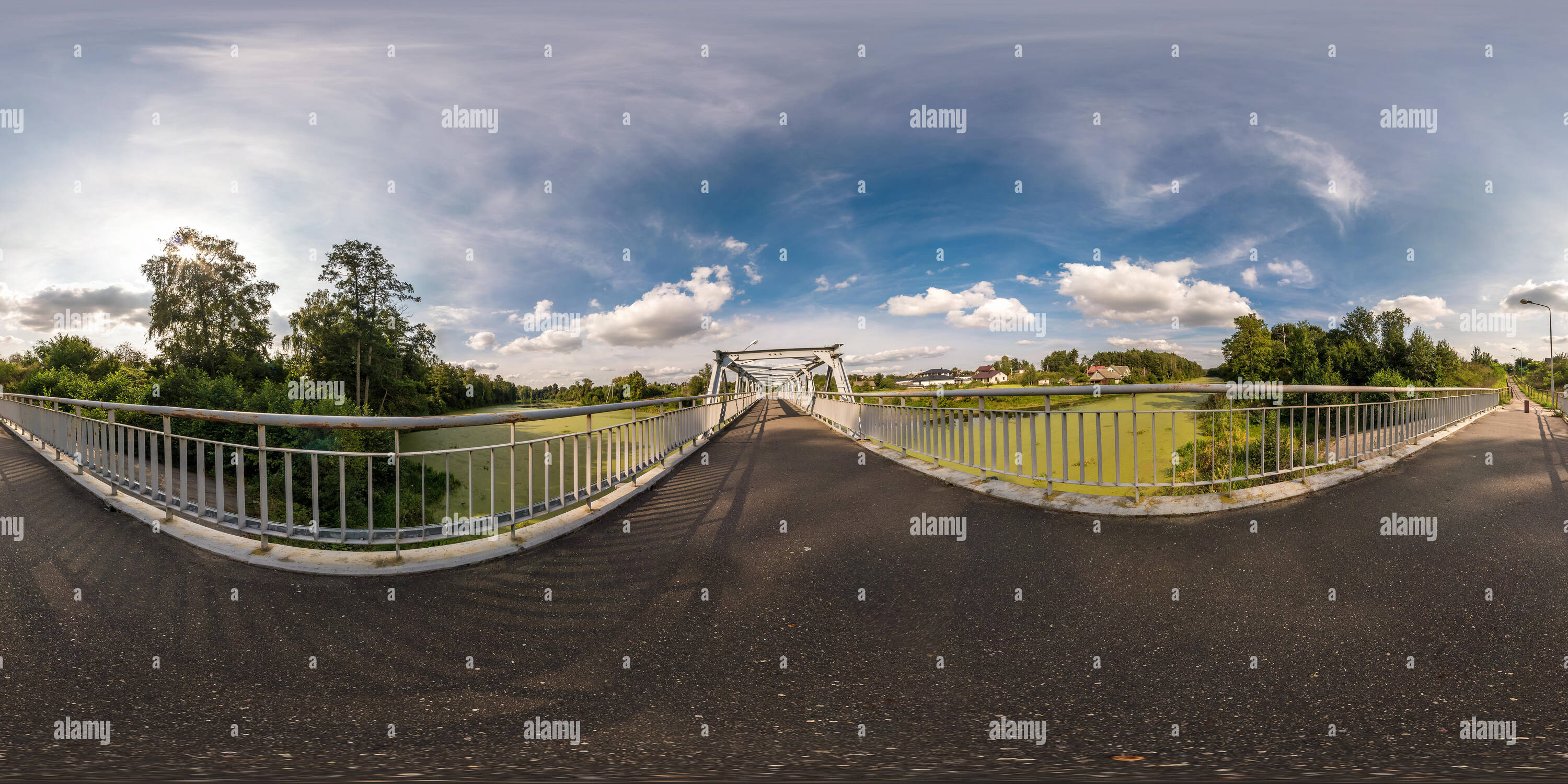 360 degree panoramic view of full seamless spherical panorama 360 by 180 angle view near iron steel frame construction of pedestrian bridge across the river in equirectangular pro