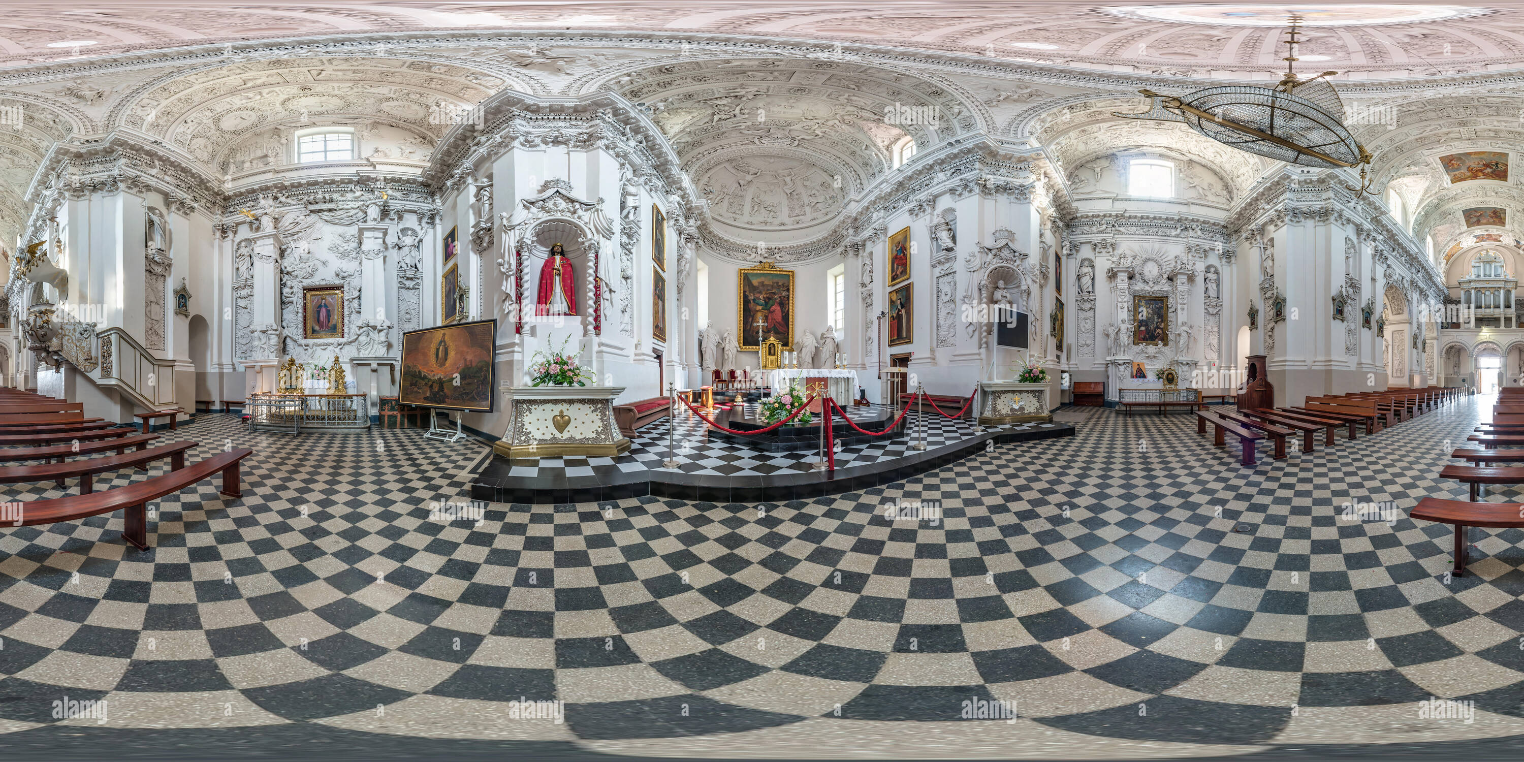 360 degree panoramic view of VILNIUS, LITHUANIA - SEPTEMBER, 2018: full seamless spherical panorama 360 by 180 degrees angle view interior baroque catholic church. 360 panorama in