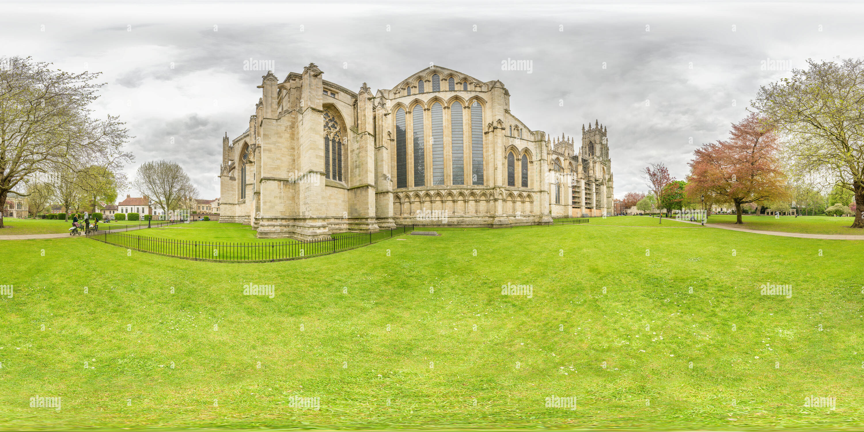 360 degree panoramic view of Dean's park and the north transept window of the medieval cathedral (minster) at York, England, on an overcast spring day.