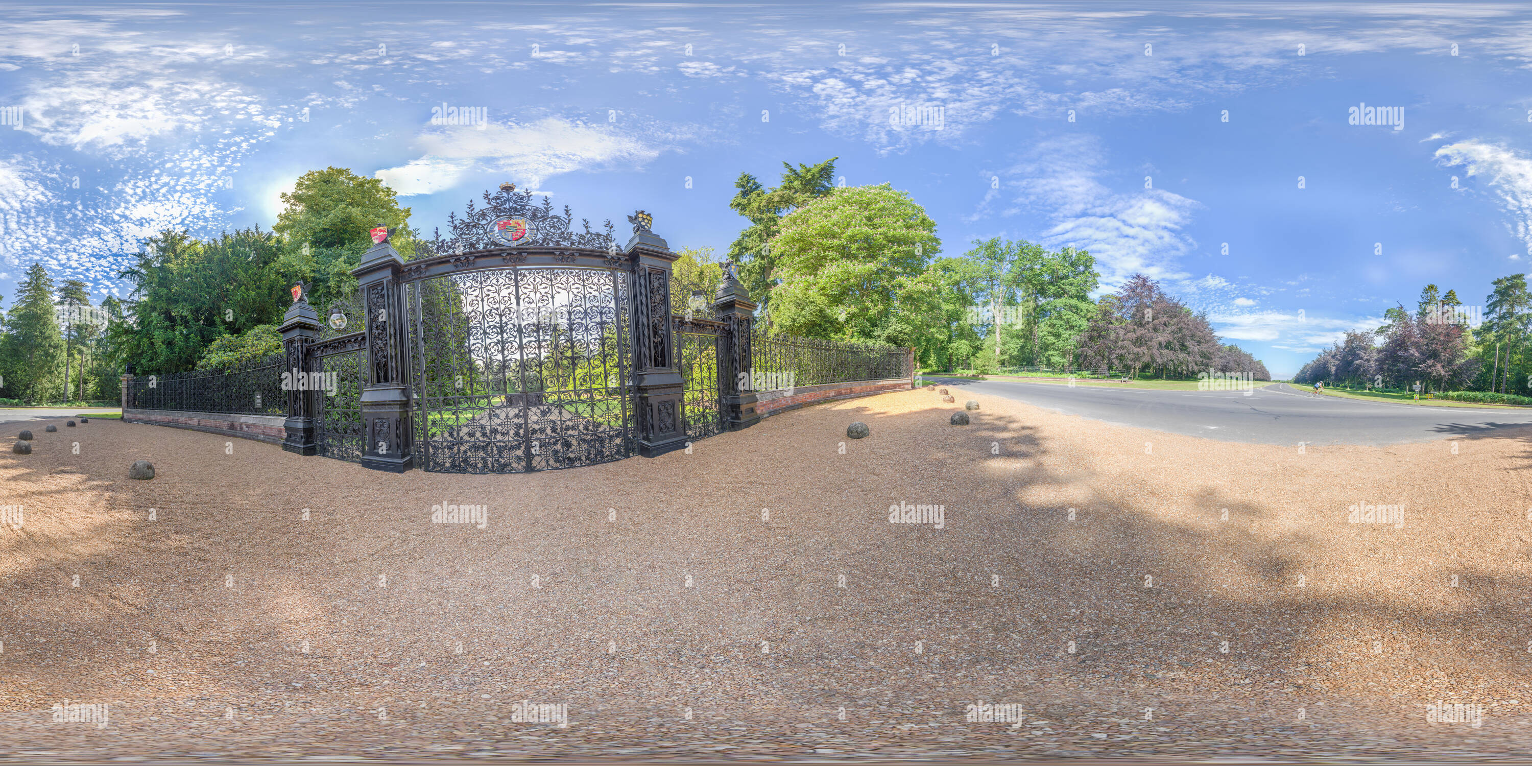 360 degree panoramic view of Main gate entrance to the royal home at Sandringham in the grounds of Sandringham park, Norfolk, on a sunny summer day.